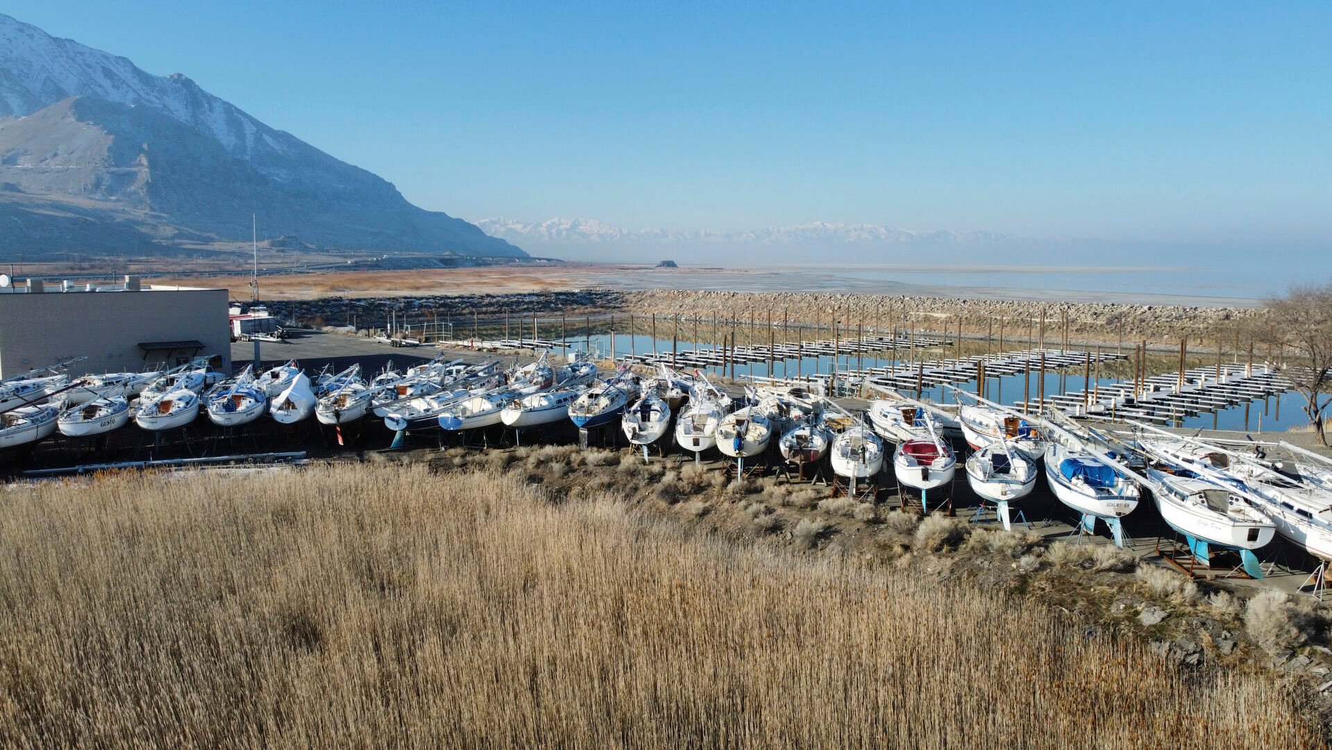 <p>Sailboats sit in dry dock at the Great Salt Lake Marina Saturday Jan. 29, 2022, near Salt Lake City. The boats were removed last year to keep them from getting stuck in the mud. </p>