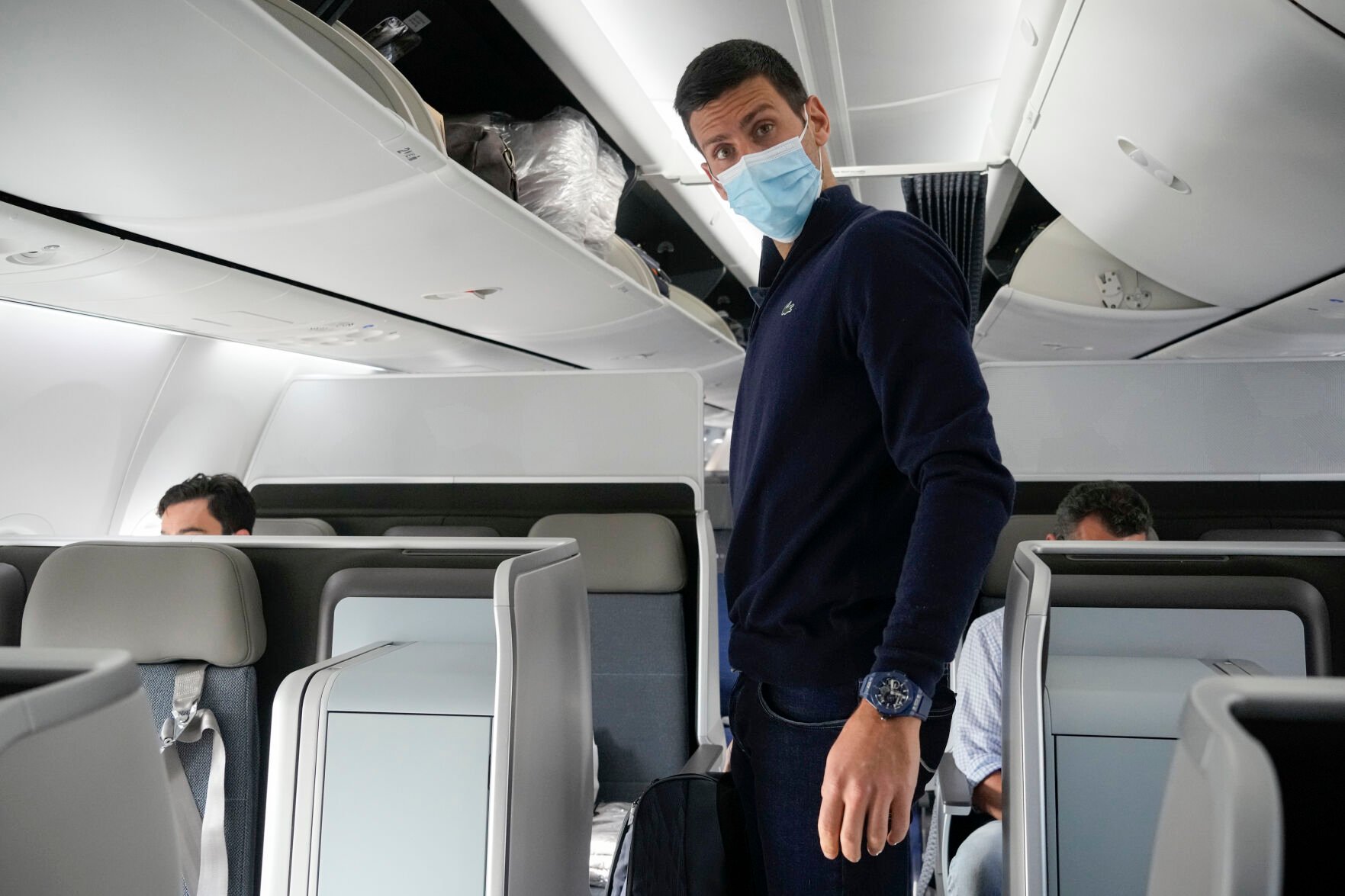 <p>Novak Djokovic prepares to take his seat on a plane to Belgrade, in Dubai, United Arab Emirates, Monday, Jan. 17, 2022. </p>