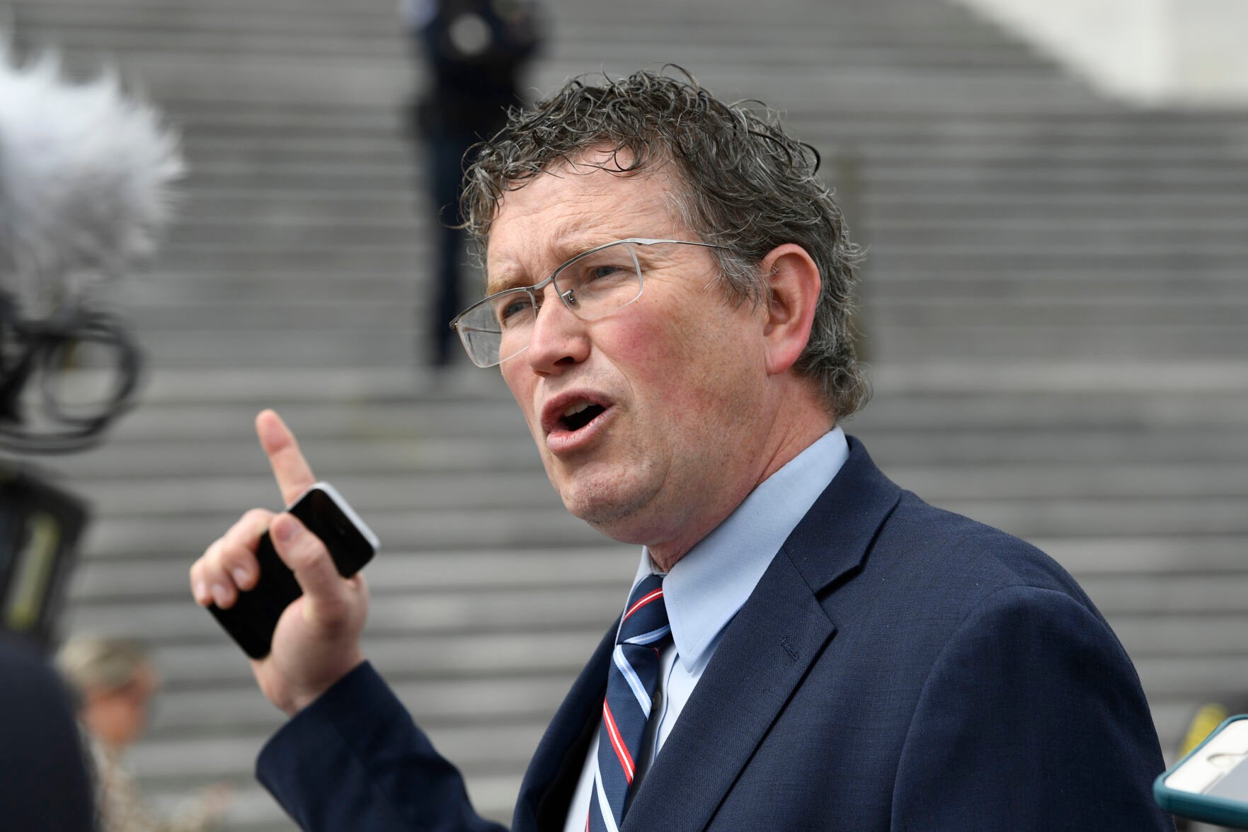 <p>FILE - In this March 27, 2020 file photo Rep. Thomas Massie, R-Ky., talks to reporters before leaving Capitol Hill in Washington. (AP Photo/Susan Walsh, file)</p>
