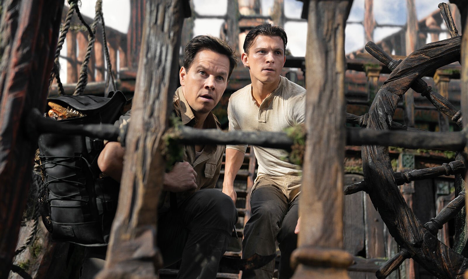 <p>Mark Wahlberg, left, and Tom Holland in "Uncharted." (Clay Enos/Columbia Pictures/TNS)</p>