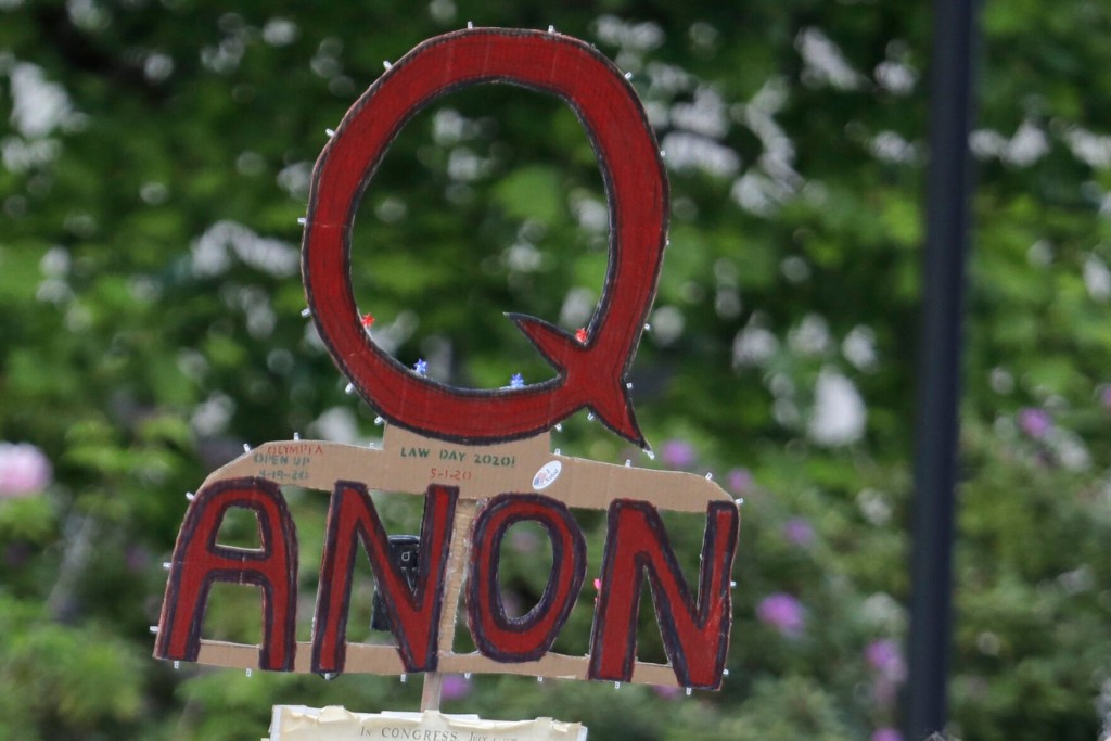 Report: Conspiracy Theorists Fueled Bump In Extremist Killings In 2021