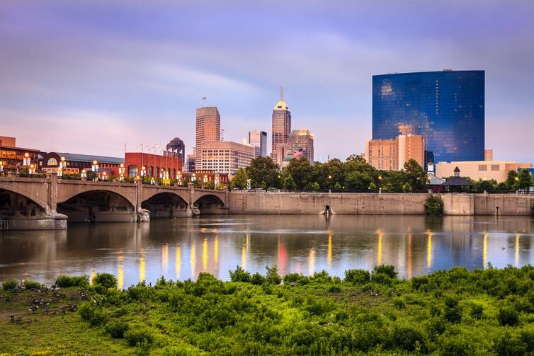 <p>People sometimes fish along the White River where it flows through Indianapolis. <a class="source" href="https://www.gettyimages.com/detail/photo/indianapolis-royalty-free-image/520980871?adppopup=true">alexeys via Getty Images</a></p>