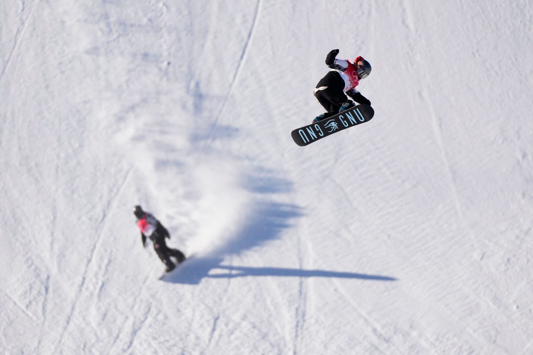 <p>United States' Jamie Anderson catches air on the slopestyle course ahead of the 2022 Winter Olympics, Wednesday, Feb. 2, 2022, in Zhangjiakou, China. </p>