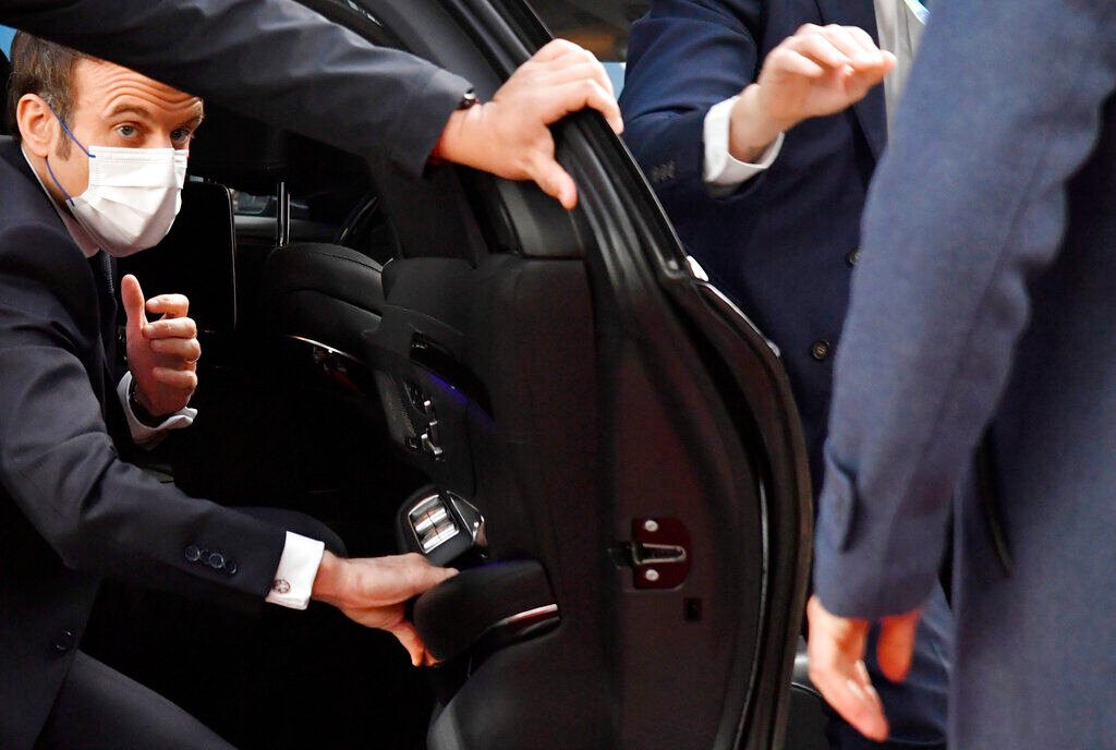 <p>FILE - French President Emmanuel Macron arrives for an extraordinary meeting of EU leaders to discuss Ukraine at the European Council building in Brussels, Feb. 17, 2022. </p>