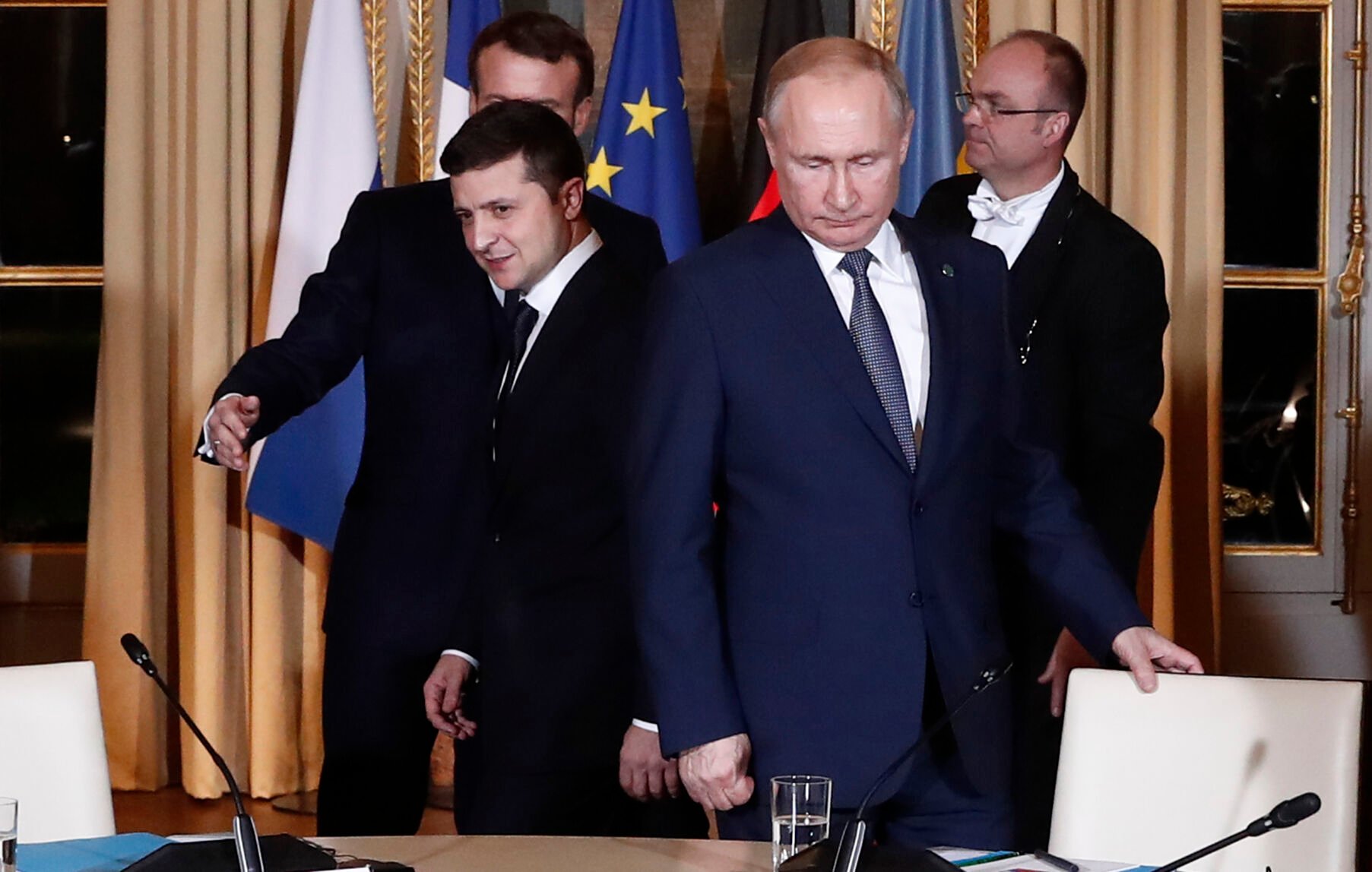 <p>FILE - Russian President Vladimir Putin, right, and Ukrainian President Volodymyr Zelenskyy arrive for a working session at the Elysee Palace, Dec. 9, 2019, in Paris. </p>