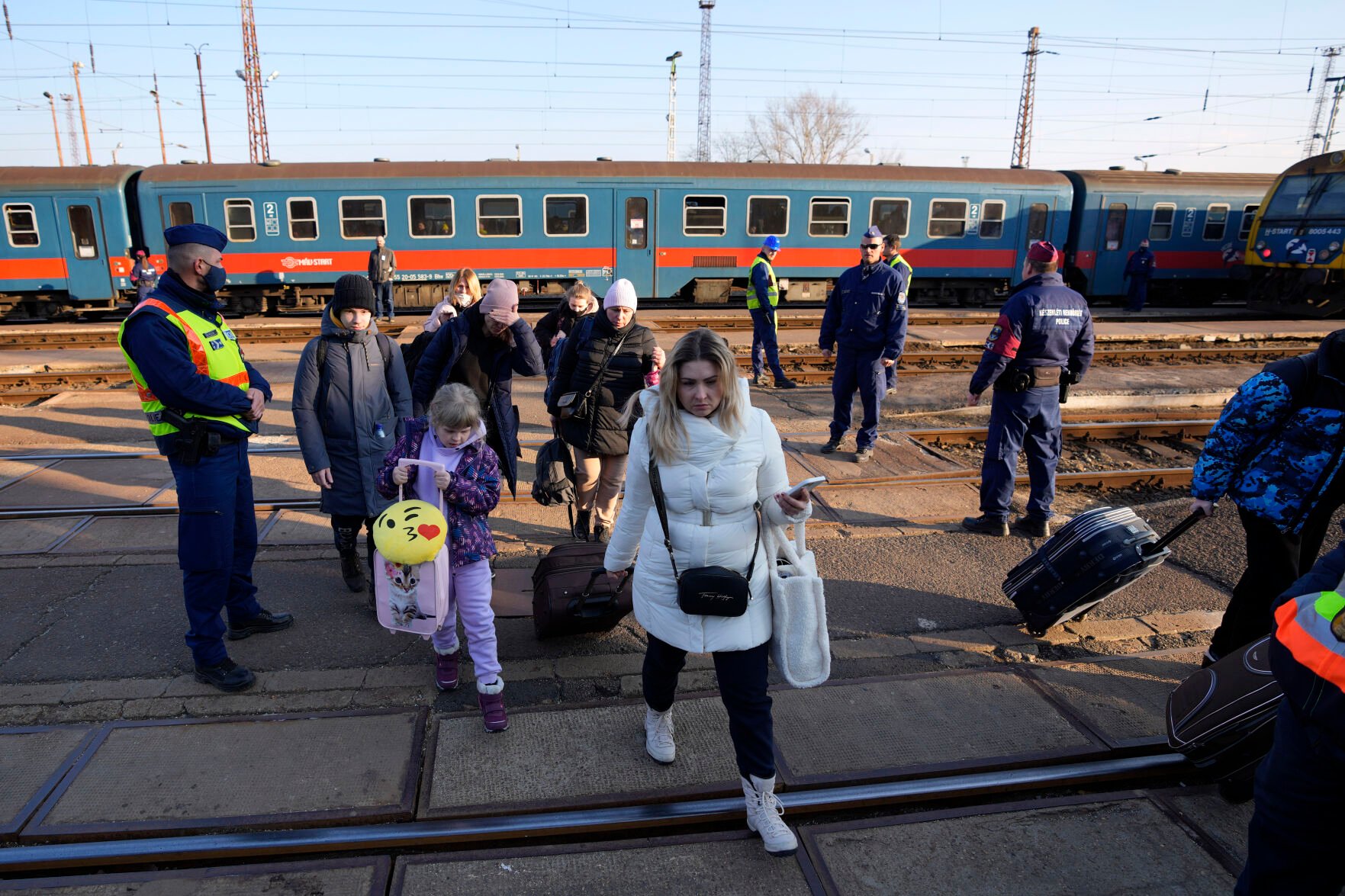 <p>Refugees that fled Ukraine from the war arrive at the train station in Zahony, Hungary, Sunday, March 6, 2022. </p>