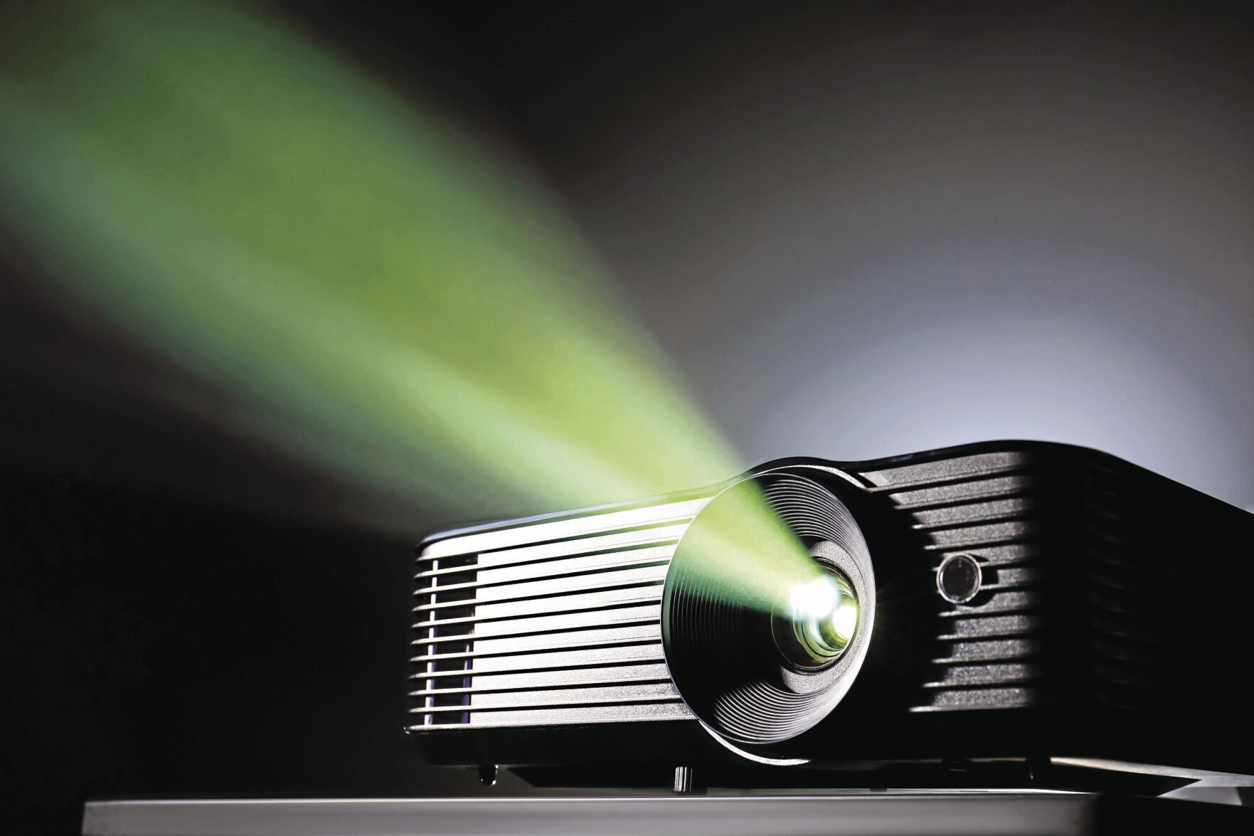 <p>Modern video projector on dark background</p>