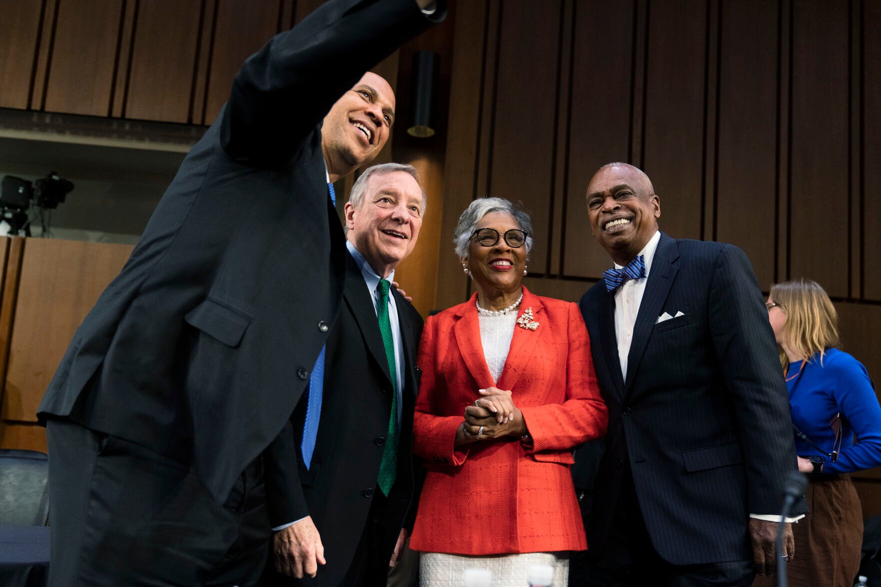 <p>Sen. Cory Booker, D-N.J., from left, and Sen. Dick Durbin, D-Ill., get their picture taken with Chair of the Congressional Black Caucus Rep. Joyce Beatty, D-Ohio, and Leadership Conference on Civil and Human Rights President and CEO Wade Henderson, as they conclude the Senate Judiciary Committee's confirmation hearing Thursday of Supreme Court nominee Ketanji Brown Jackson on Capitol Hill in Washington.</p>
