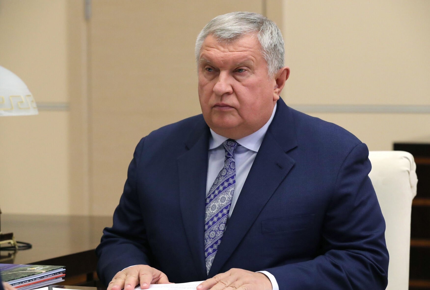 <p>The French finance ministry says it's seized a yacht owned by Russian oligarch Igor Sechin, pictured here, during a meeting with Russia's President Putin.</p>