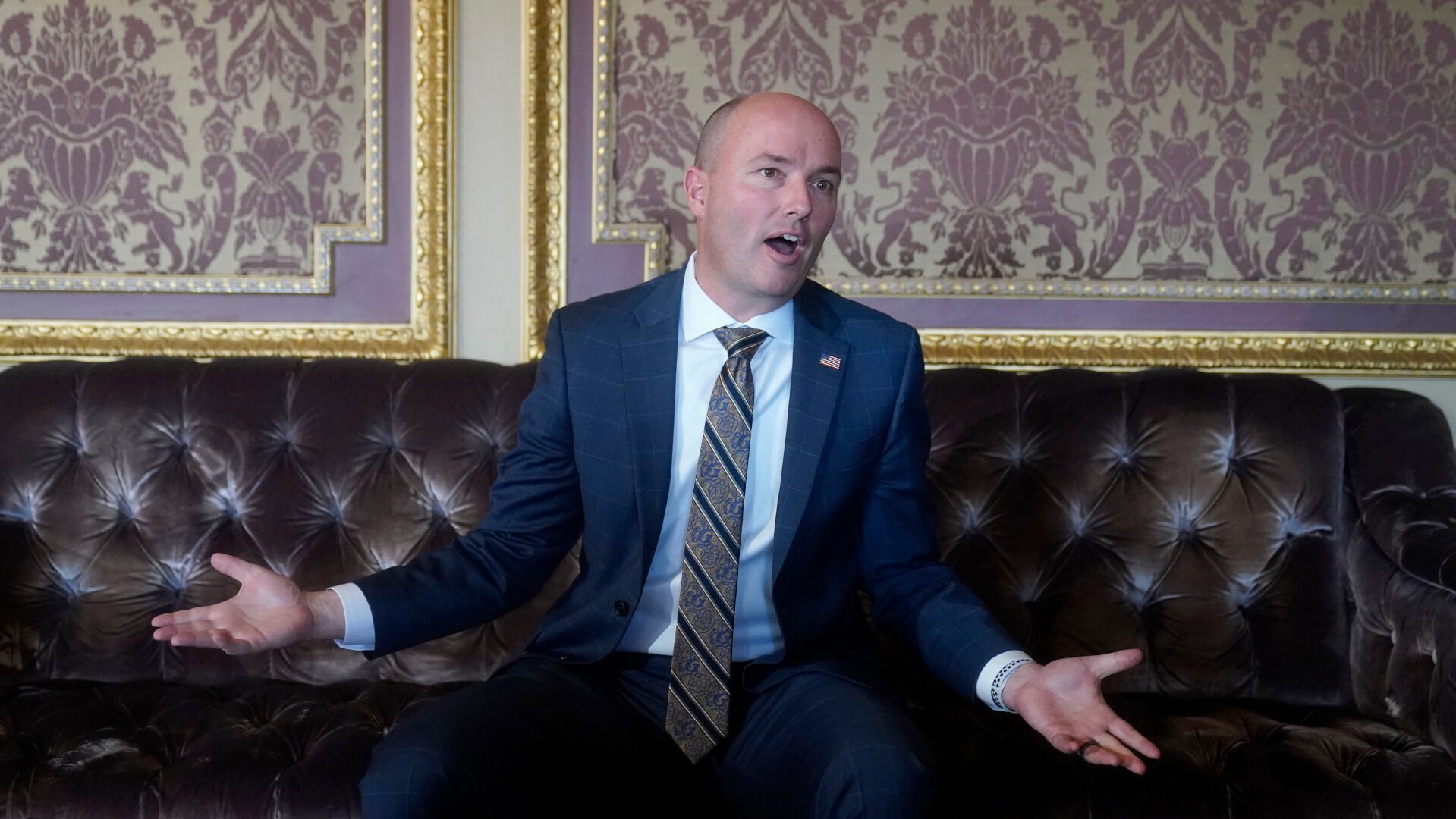 <p>FILE - Utah Gov. Spencer Cox speaks during an interview at the Utah State Capitol, Friday, March 4, 2022, in Salt Lake City. Cox vetoed a ban on transgender students playing girls’ sports on Tuesday, March 22, 2022, becoming the second Republican governor to overrule state lawmakers who have taken on youth sports in a broader culture war over how Americans view gender and sexuality. </p>