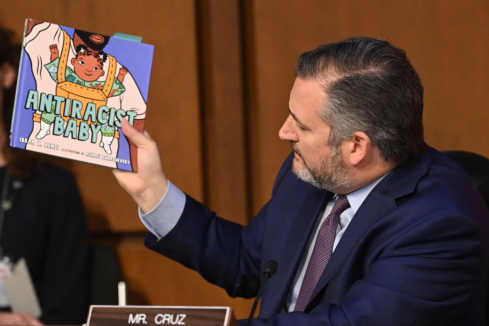 <p>U.S. Sen. Ted Cruz, R-Texas, holds a book titled "Antiracist Baby" while speaking during the U.S. Supreme Court confirmation hearing for Judge Ketanji Brown Jackson before the Senate Judiciary Committee in Washington, D.C.</p>