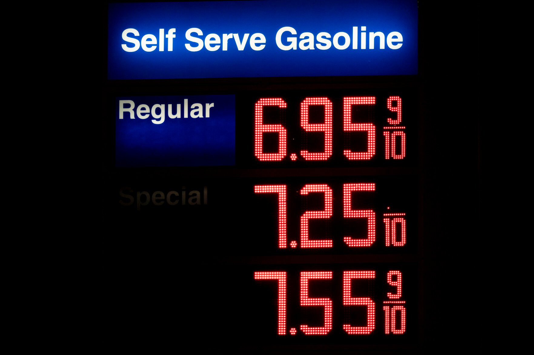 <p>FILE - Gas prices are displayed at a Mobil gas station in West Hollywood, Calif., on March 8, 2022. Social media users are suggesting soaring fuel prices in the U.S. are part of a government scheme to get drivers into electric vehicles. The conspiracy theory posts are spreading across Facebook, Twitter and Instagram.</p>