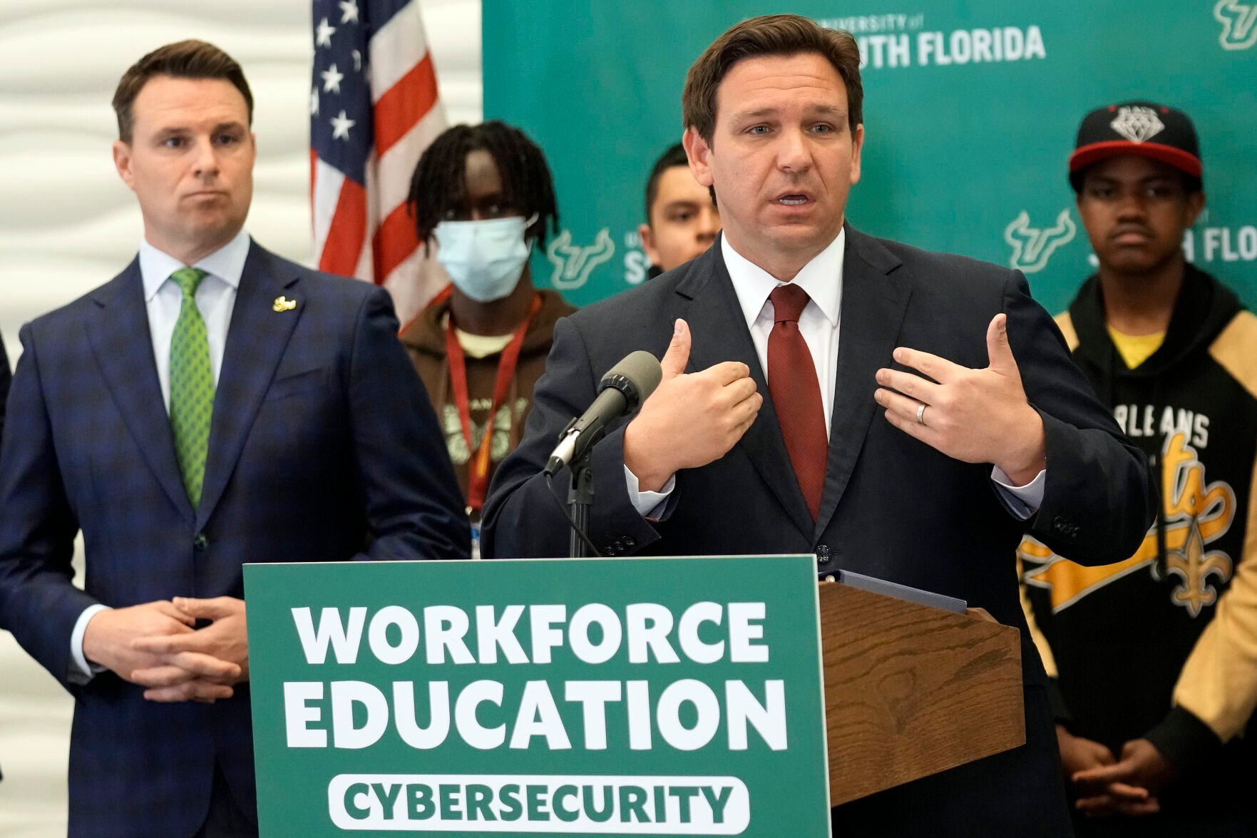 <p>Florida Gov. Ron DeSantis speaks Wednesday during a news conference after announcing a million dollar program to create cybersecurity opportunities through the Florida Center for Cybersecurity at the University of South Florida in Tampa, Fla.</p>