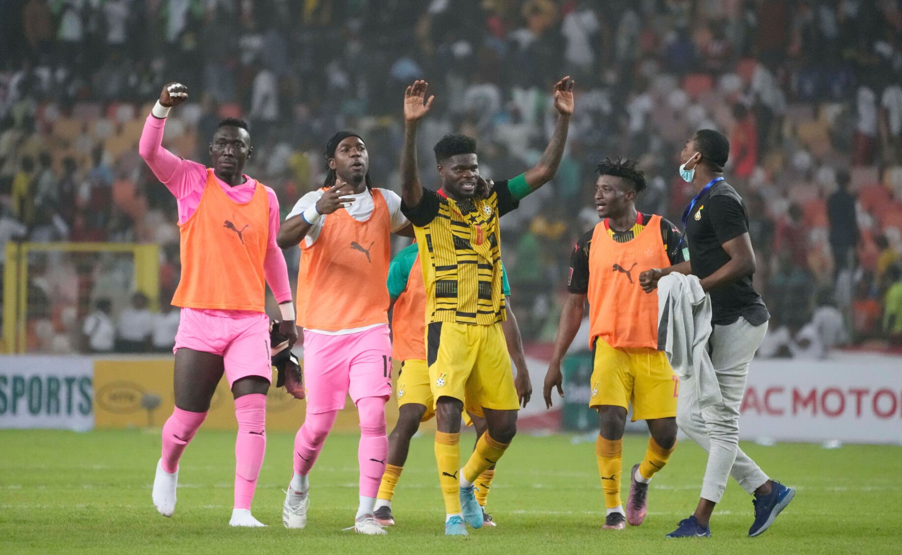 <p>Ghana's players, including goalscorer Thomas Partey (center), celebrate qualifying for the 2022 World Cup in Qatar in Abuja, Nigeria, on March 29.</p>