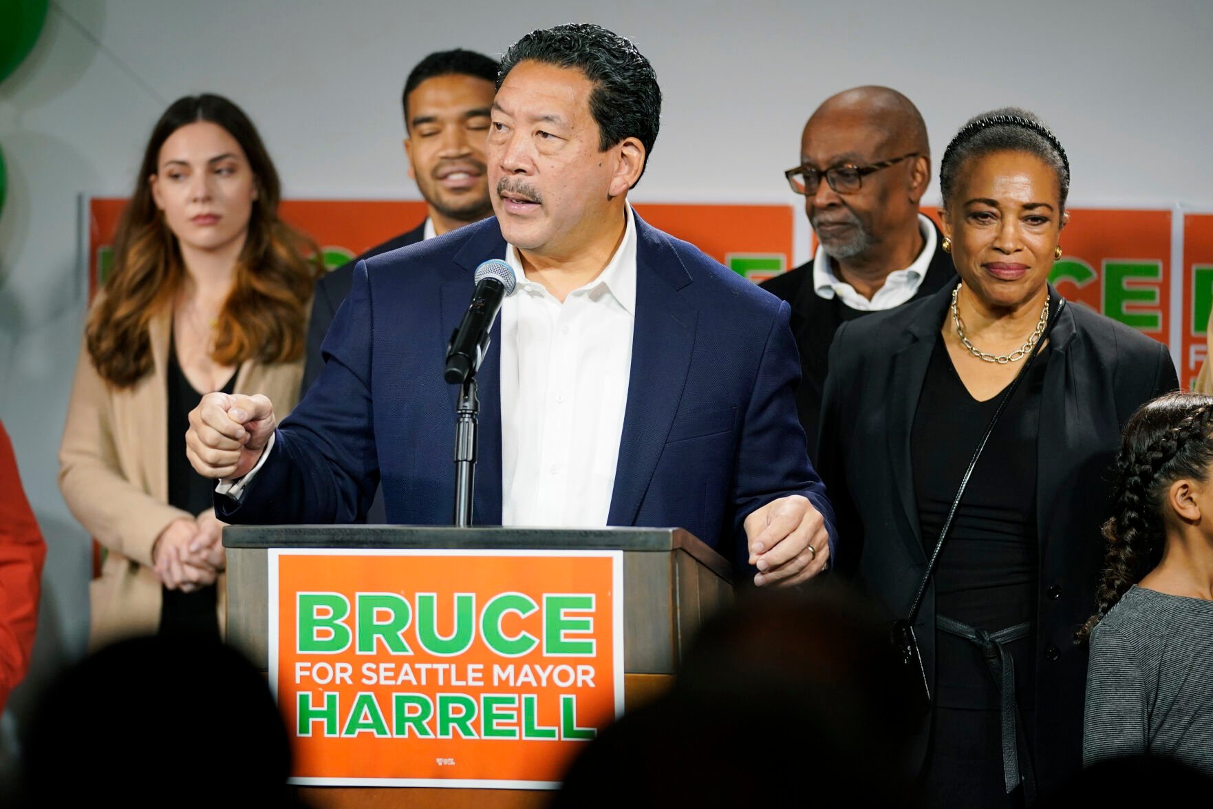 <p>FILE - Seattle Mayor Bruce Harrell, center, talks to supporters at an election night rally, Nov. 2, 2021, in Seattle as his wife, Joanne Harrell, right, looks on. </p>
