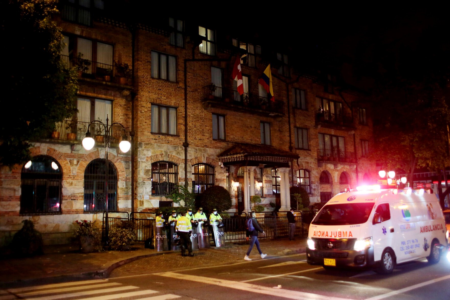 <p>Police stand guard the hotel where drummer Taylor Hawkins was found dead in Bogota, Colombia, Saturday, March 26, 2022. Hawkins, for 25 years the drummer for Foo Fighters and best friend of frontman Dave Grohl, has died during a South American tour with the rock band. He was 50. </p>