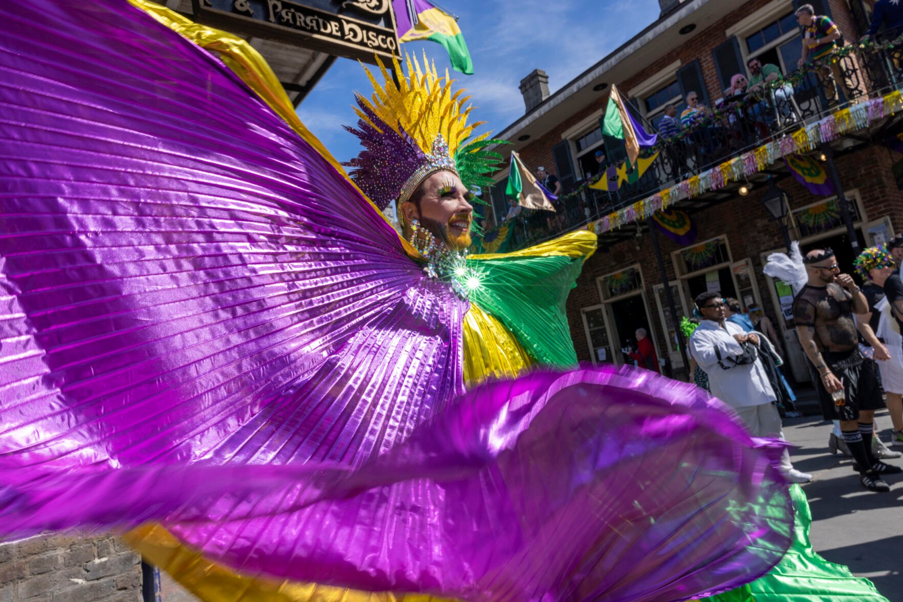 <p>People participate in the Bourbon Street Awards costume contest on Tuesday, March 1, 2022, in the French Quarter of New Orleans on Mardi Gras.</p>