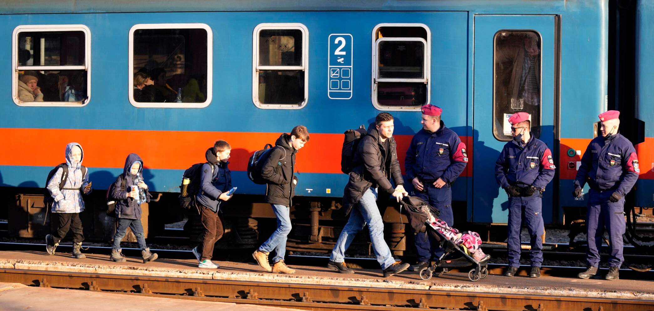 <p>Refugees that fled Ukraine from the war arrive at the train station in Zahony, Hungary, Sunday, March 6, 2022. </p>