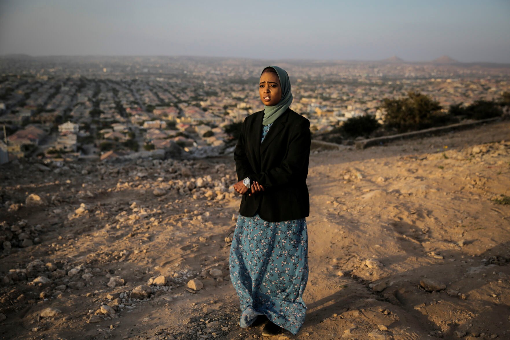 <p>Nurse Hana Ismail, who was moved to write a poem with the words "I have a mark that can never be erased" describing the practice of having to take a knife to the scars resulting from female genital mutilation (FGM) to open the way for women in labor, prepares to be interviewed in Hargeisa, Somaliland, a semi-autonomous breakaway region of Somalia, Tuesday, Feb. 8, 2022. Officials and health workers say cases of female genital mutilation increased during the pandemic in parts of Africa and particularly in Somaliland where 98 percent of girls aged 5 to 11 undergo the procedure. (AP Photo/Brian Inganga)</p>
