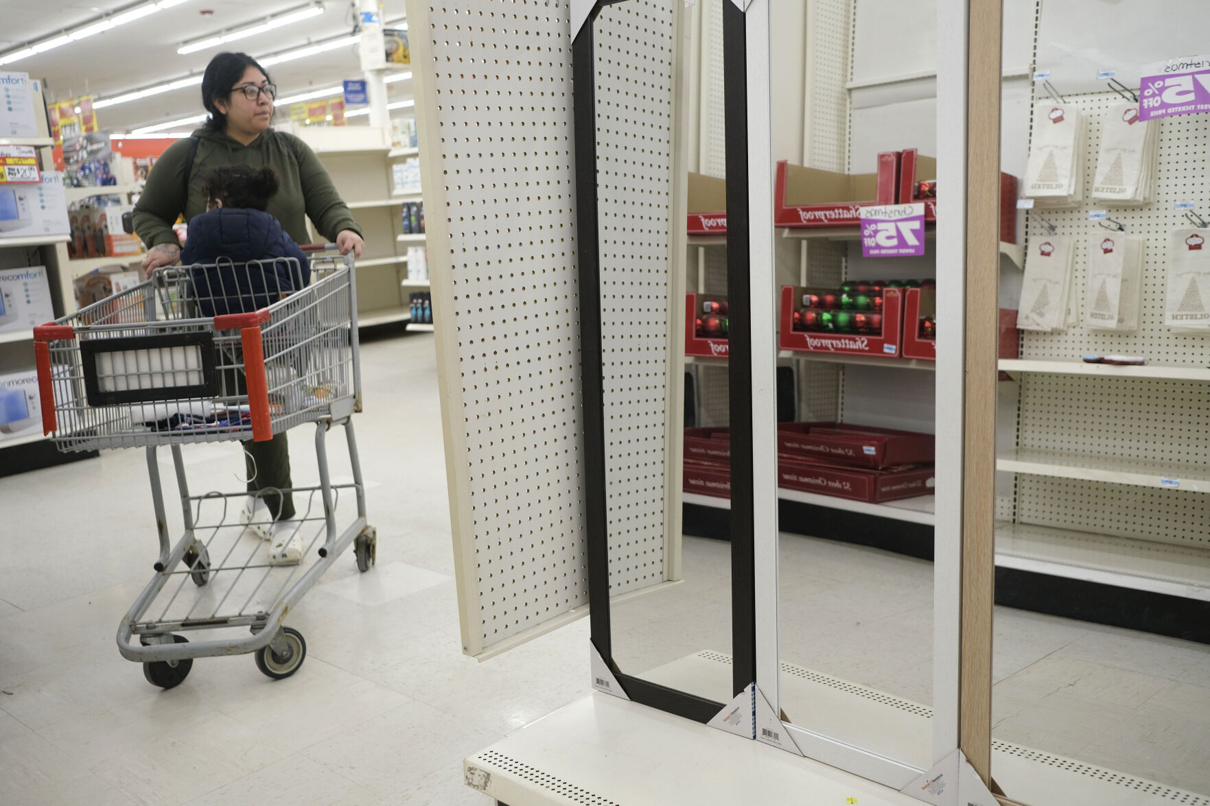 <p>People shop half-empty shelves April 4 at the Kmart in Avenel, N.J. When the Kmart in Avenel closes its doors Saturday, it will leave only three remaining U.S. locations for the former retail powerhouse.</p>