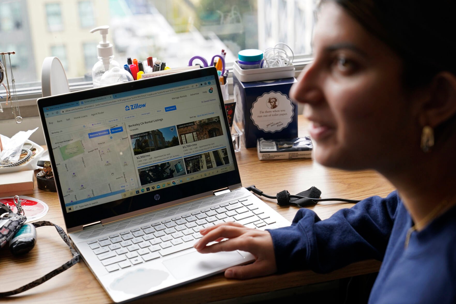 <p>University of California, Berkeley freshman Sanaa Sodhi talks with a friend in her on-campus dorm room while searching online for apartments in Berkeley, Calif., Tuesday, March 29, 2022. </p>