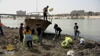 Watch Now: Young Volunteers Strive To Clean Up Polluted Tigris River In Iraq