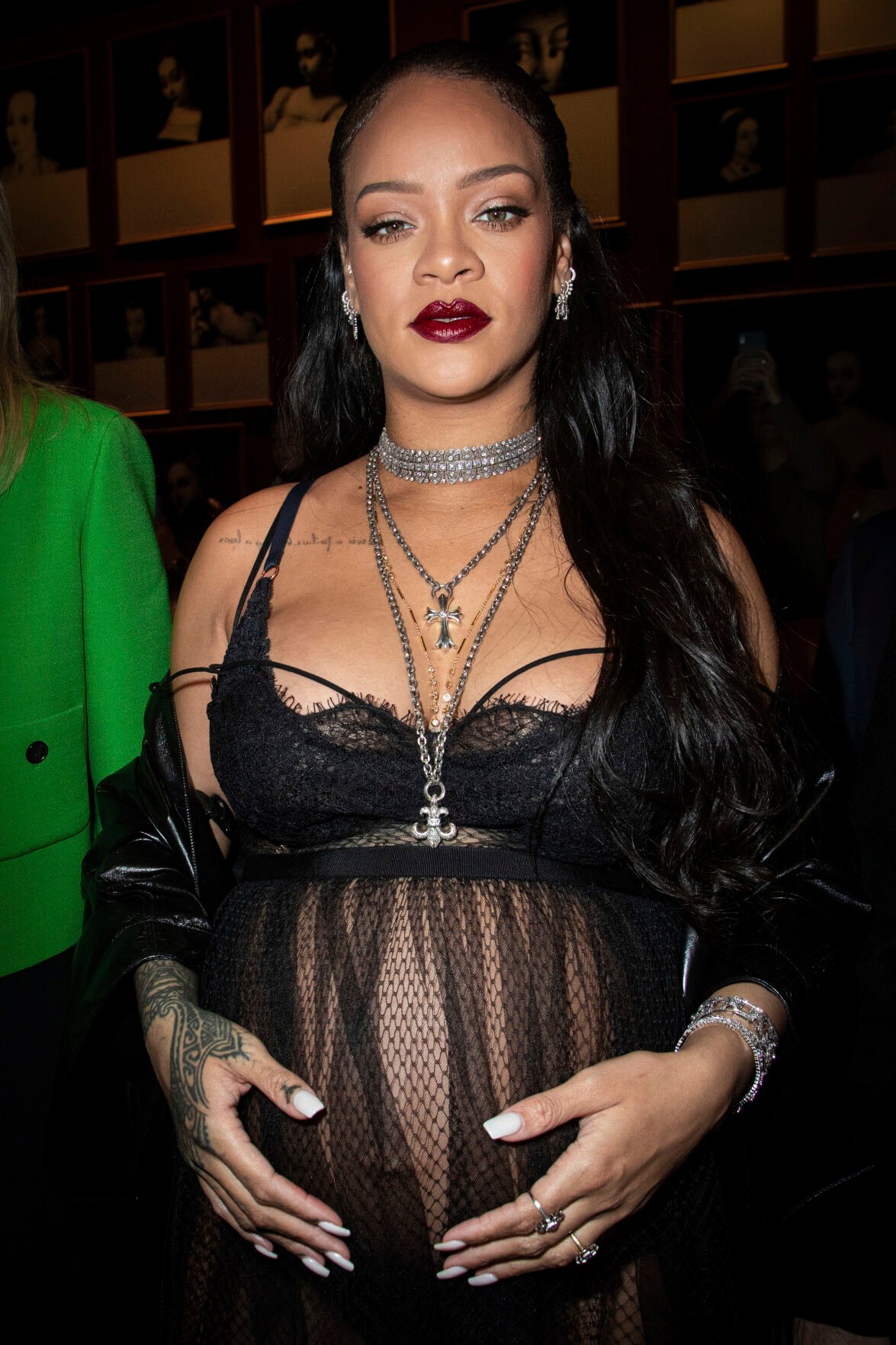 <p>FILE - Rihanna appears at the Dior Ready To Wear Fall/Winter 2022-2023 fashion collection in Paris on March 1, 2022. Now in her third trimester, the music star, and fashion and beauty mogul hasn't exactly been hiding under a maternity tent since she and boyfriend A$AP Rocky announced they were expecting. She's made the fashion week rounds in Milan and Paris wearing a range of couture that shows off her belly. (Photo by Vianney Le Caer/Invision/AP, File)</p>