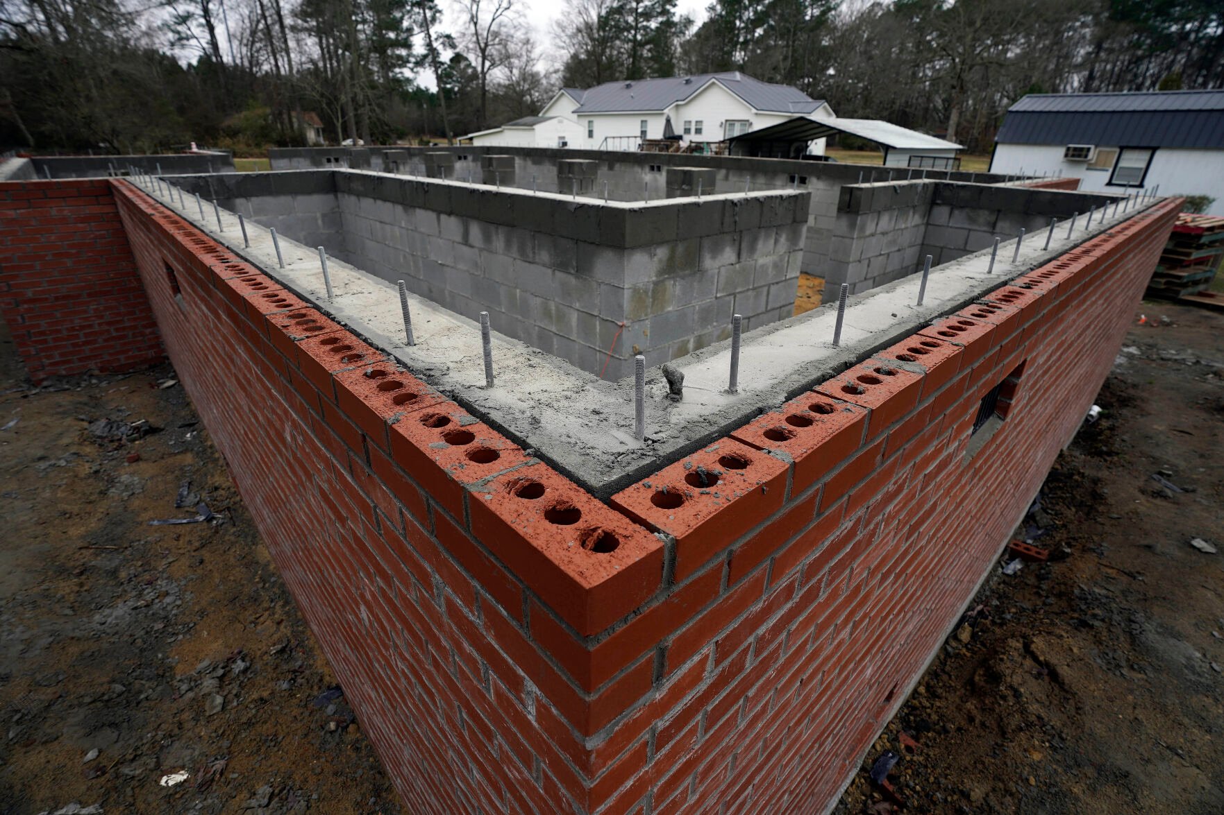 <p>A home in Princeville, N.C., is in the process of having the foundation raised Thursday, March 10, 2022. Flooding from past hurricanes has left permanent damage to the vulnerable community along the Tar River. Some residents have received funding to help rebuild homes and raise foundations. </p>