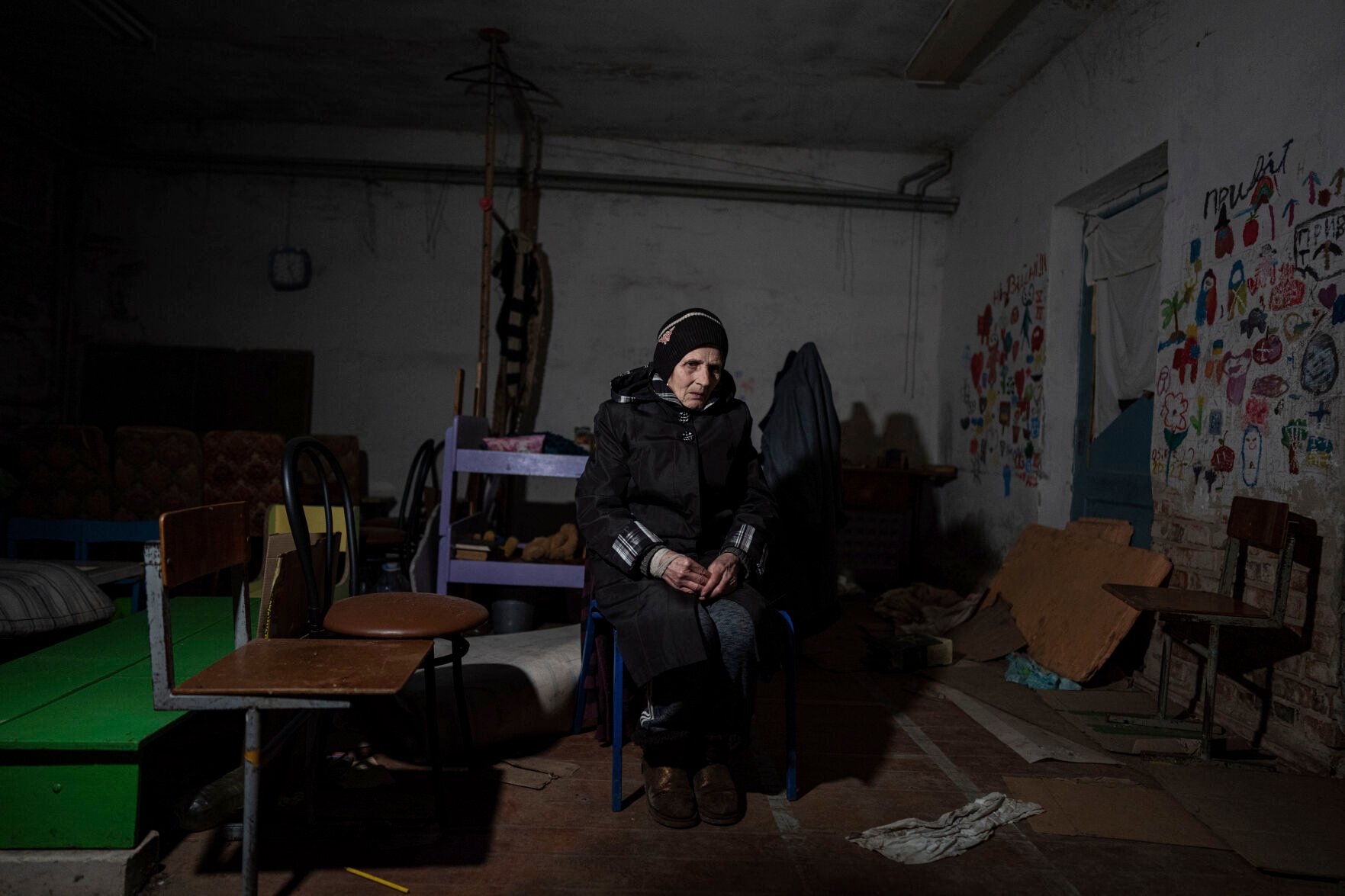 <p>Valentina Saroyan sits in the basement of a school Tuesday in Yahidne, near Chernihiv, Ukraine. Residents say more than 300 people were trapped for weeks by Russian occupiers in the basement.</p>