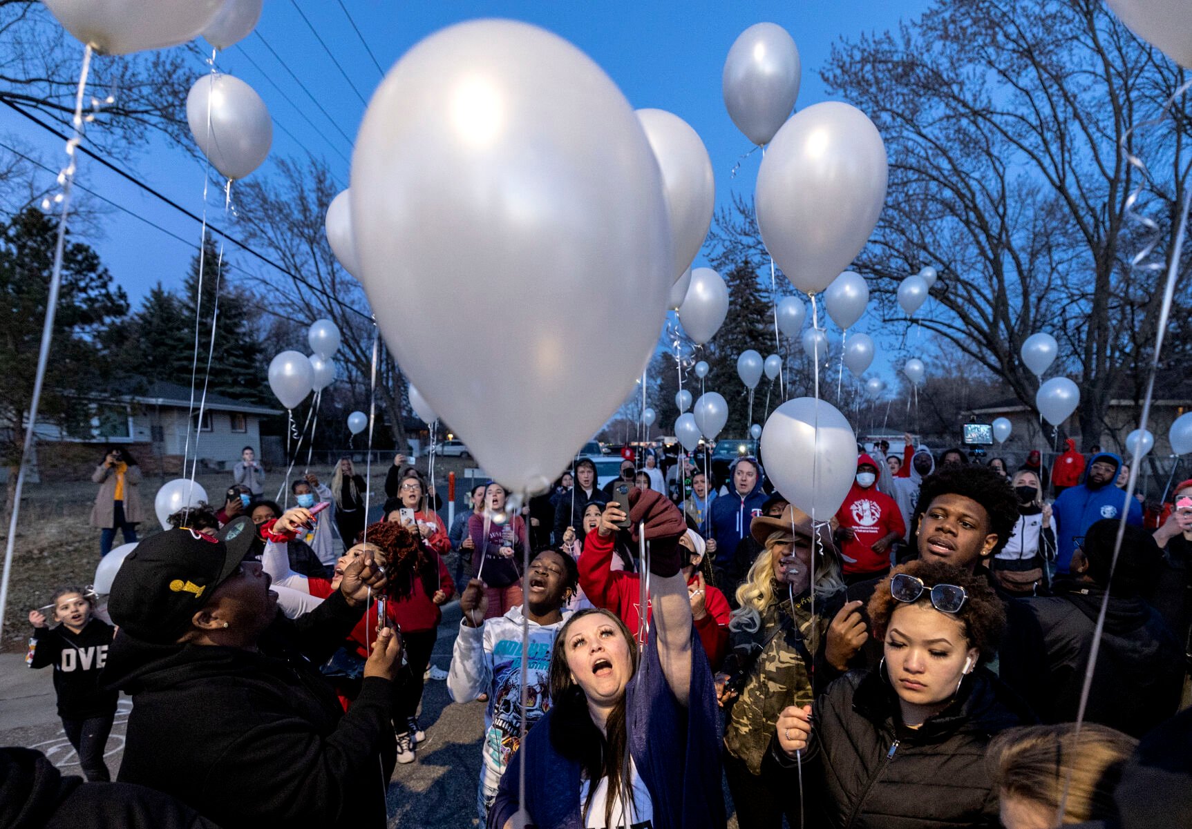 <p>Katie Wright, mother of Daunte Wright, and attendees release balloons at a vigil honoring Daunte Wright on the one-year anniversary of his death Monday, April 11, 2022, in Brooklyn Center, Minn. Wright was fatally shot by a Minnesota police officer during a traffic stop.</p>