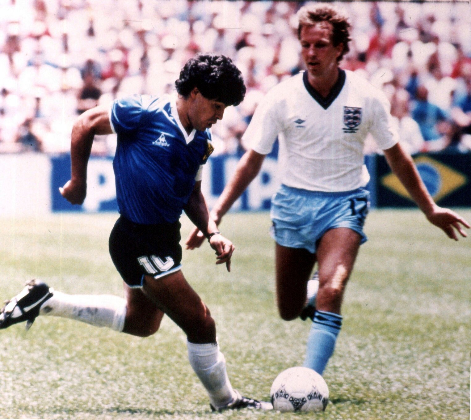 <p>FILE - Argentina's Diego Maradona, left, tries to go past England's Trevor Steven, during the World Cup quarter final match, in the Aztec Stadium, Mexico City, on June 22, 1986.</p>