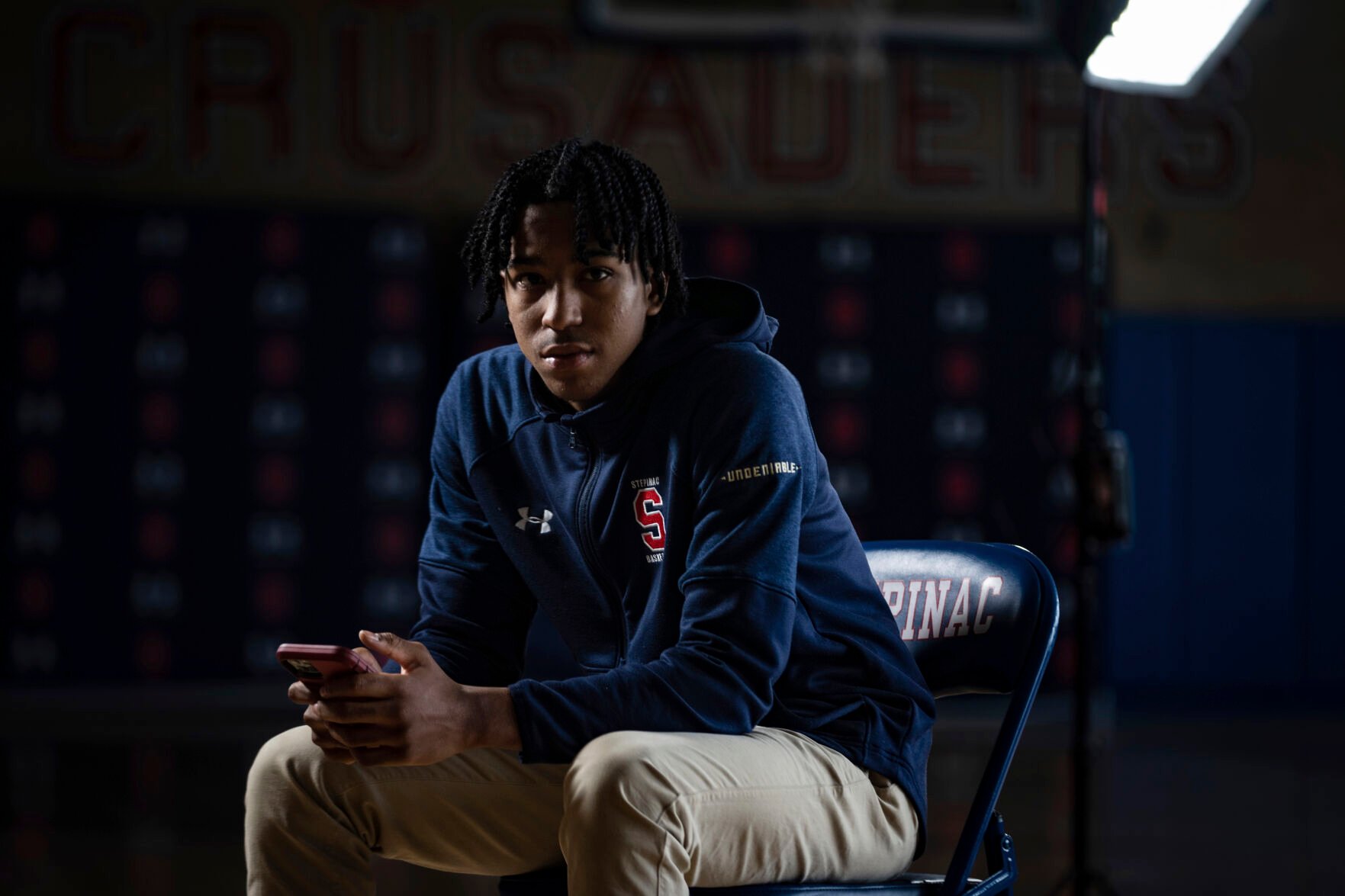 <p>Johnuel "Boogie" Fland poses for a portrait on the basketball court at Archbishop Stepinac High School in White Plains, N.Y., Monday, May 2, 2022. </p>