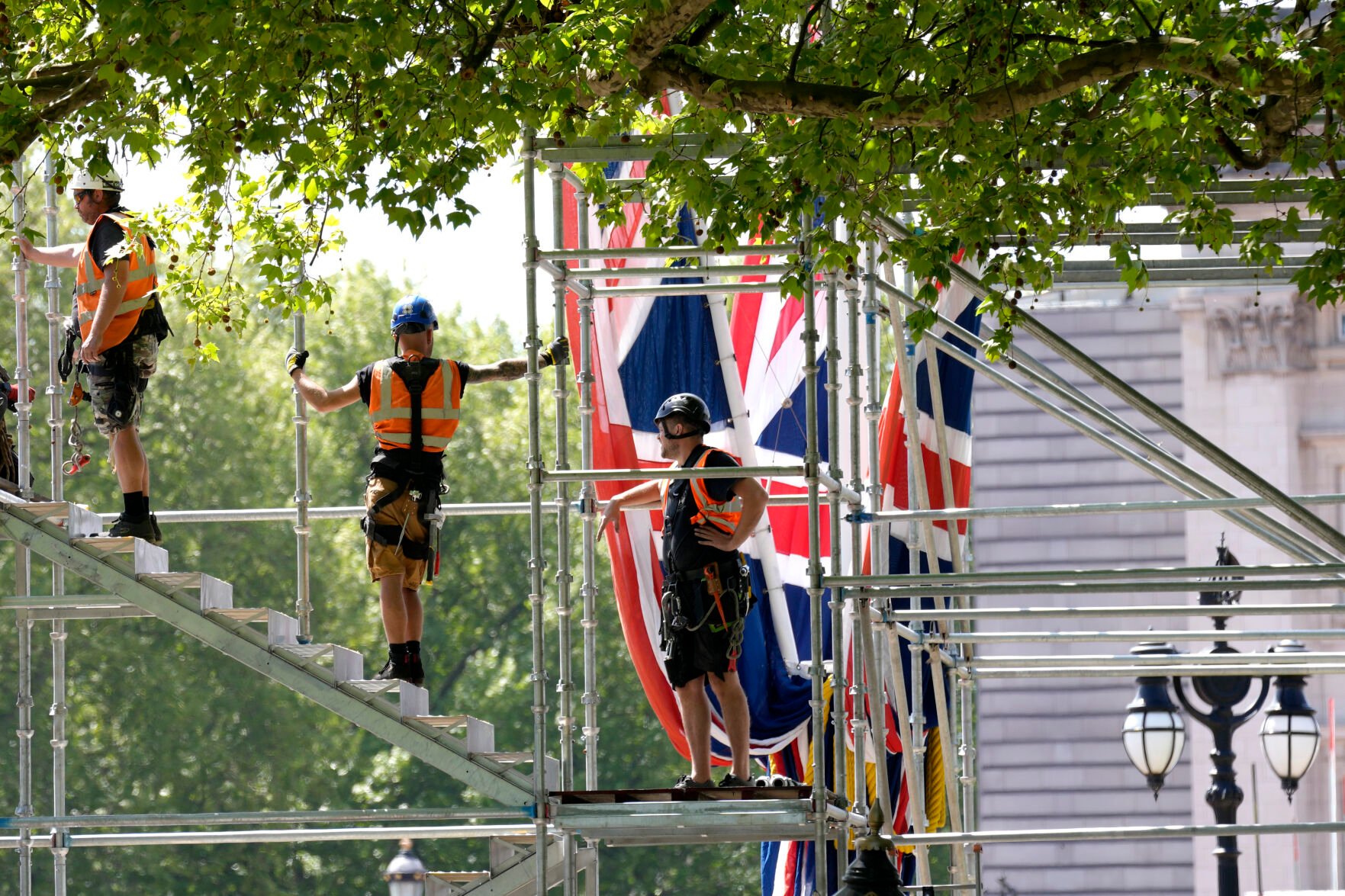 <p>Building work in preparation for the Platinum Jubilee celebrations take place in front of Buckingham Palace in London, Friday, May 6, 2022. Britain's Queen Elizabeth II acceded to the throne on the death of her father King George VI on Feb. 6, 1952, and the Platinum Jubilee bank holiday weekend celebrations will take place on June 2-5.</p>