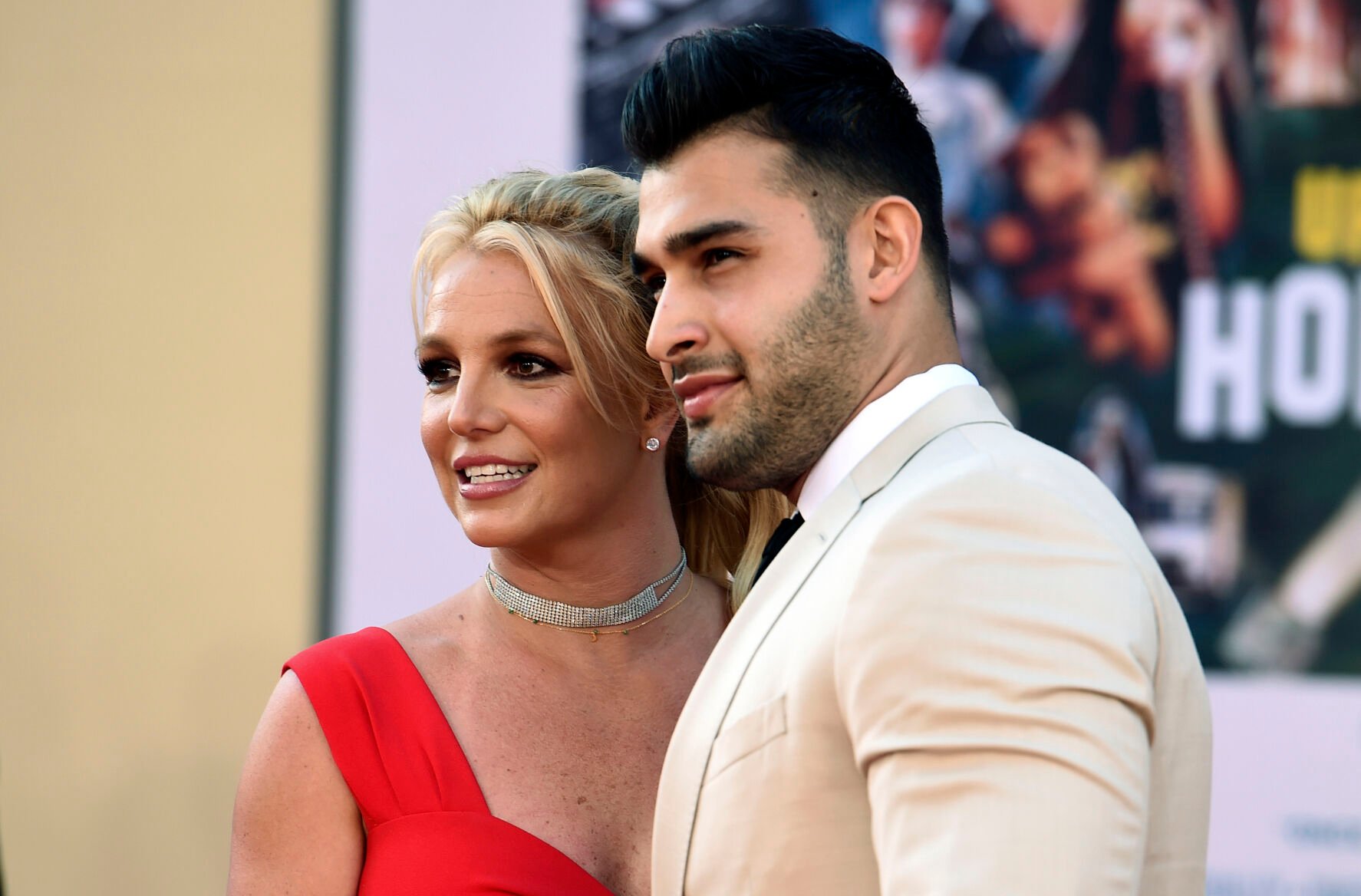 <p>Britney Spears and Sam Asghari arrive at the Los Angeles premiere of "Once Upon a Time in Hollywood" at the TCL Chinese Theatre on July 22, 2019.</p>