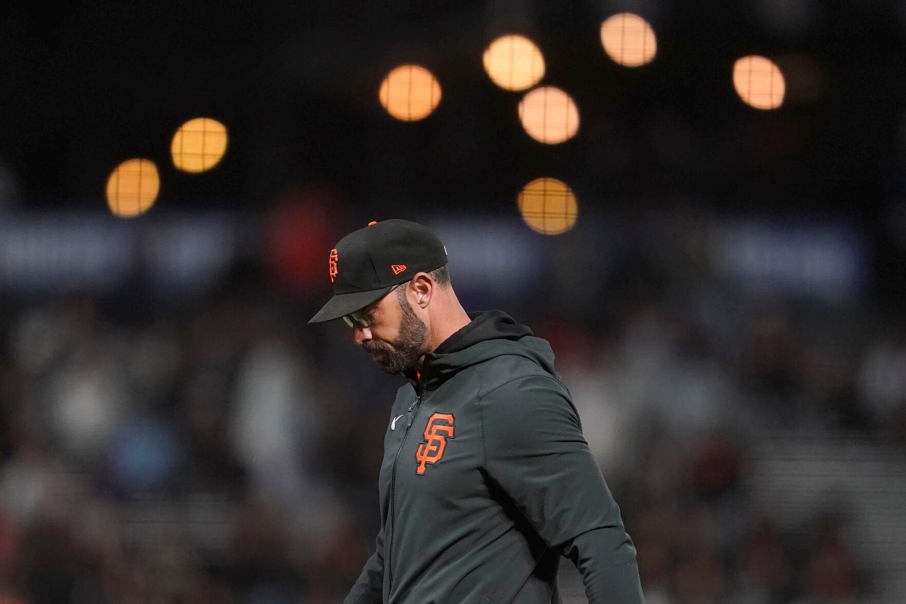 <p>San Francisco Giants manager Gabe Kapler walks to the dugout after making a pitching change during the eighth inning of his team's baseball game against the New York Mets in San Francisco, Monday, May 23, 2022. (AP Photo/Jeff Chiu)</p>
