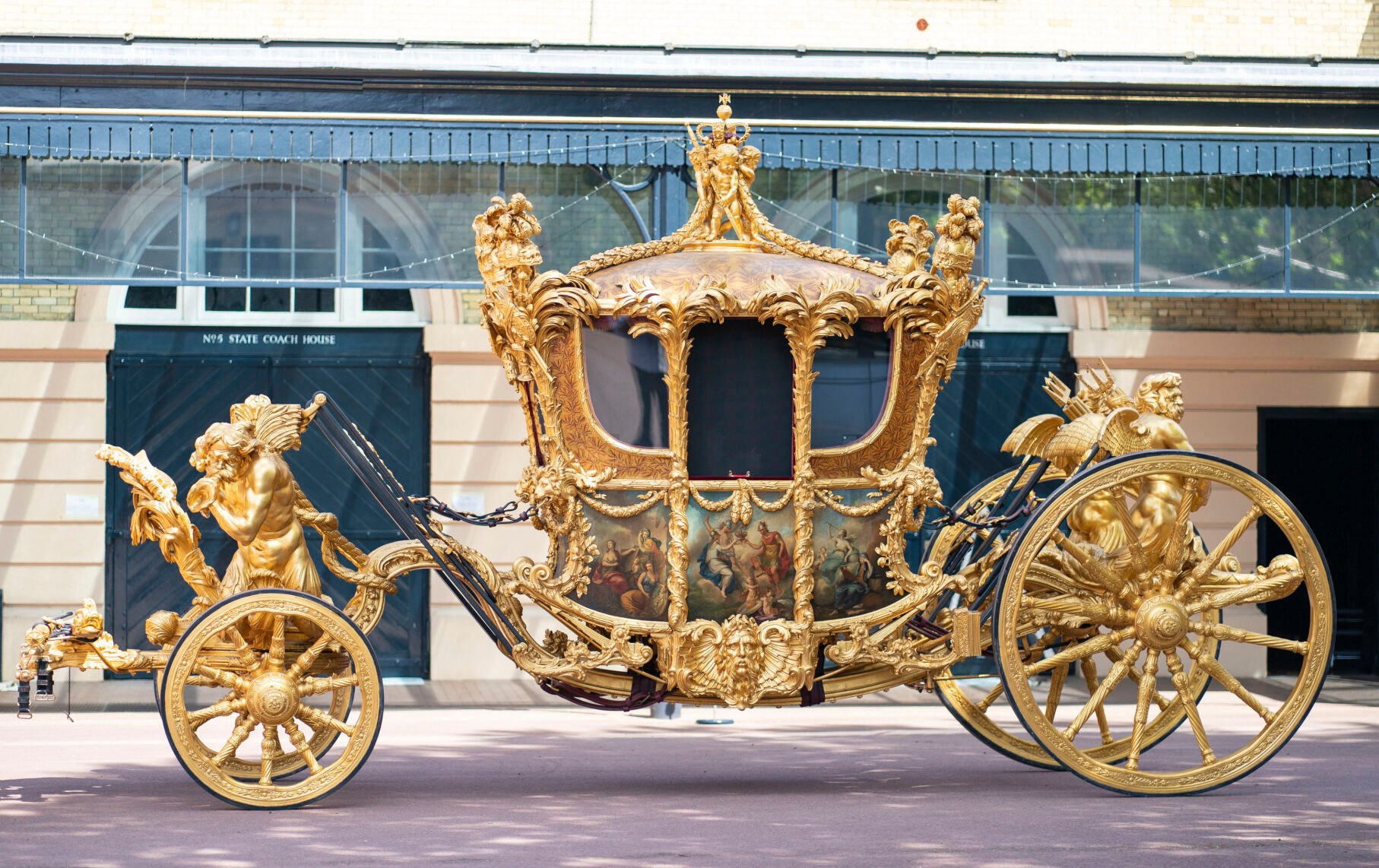 <p>A general view of the Gold State Coach, at the Royal Mews, Buckingham Palace, London, Friday May 6, 2022. The coach will be used as part of Queen's Platinum Jubilee celebrations. </p>