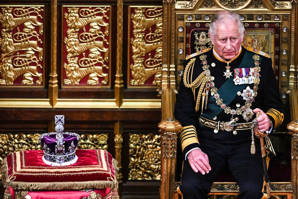 <p>Britain's Prince Charles sits by the The Imperial State Crown in the House of Lords Chamber, during the State Opening of Parliament, in the Houses of Parliament, in London, Tuesday, May 10, 2022. </p>