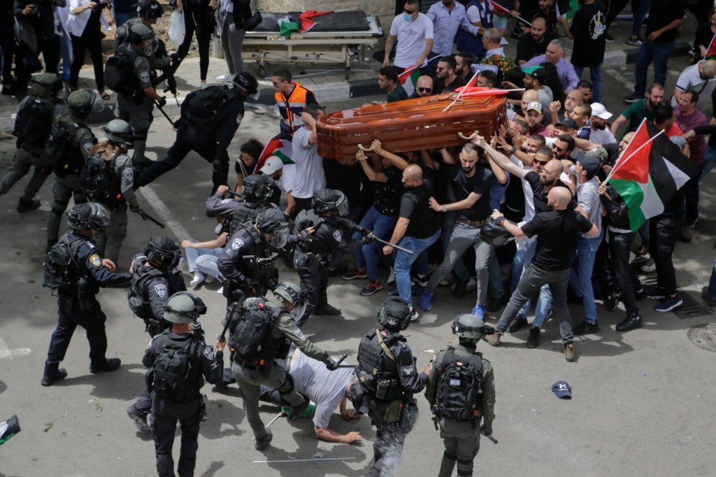 Israeli Police Beat Pallbearers At Journalist’s Funeral