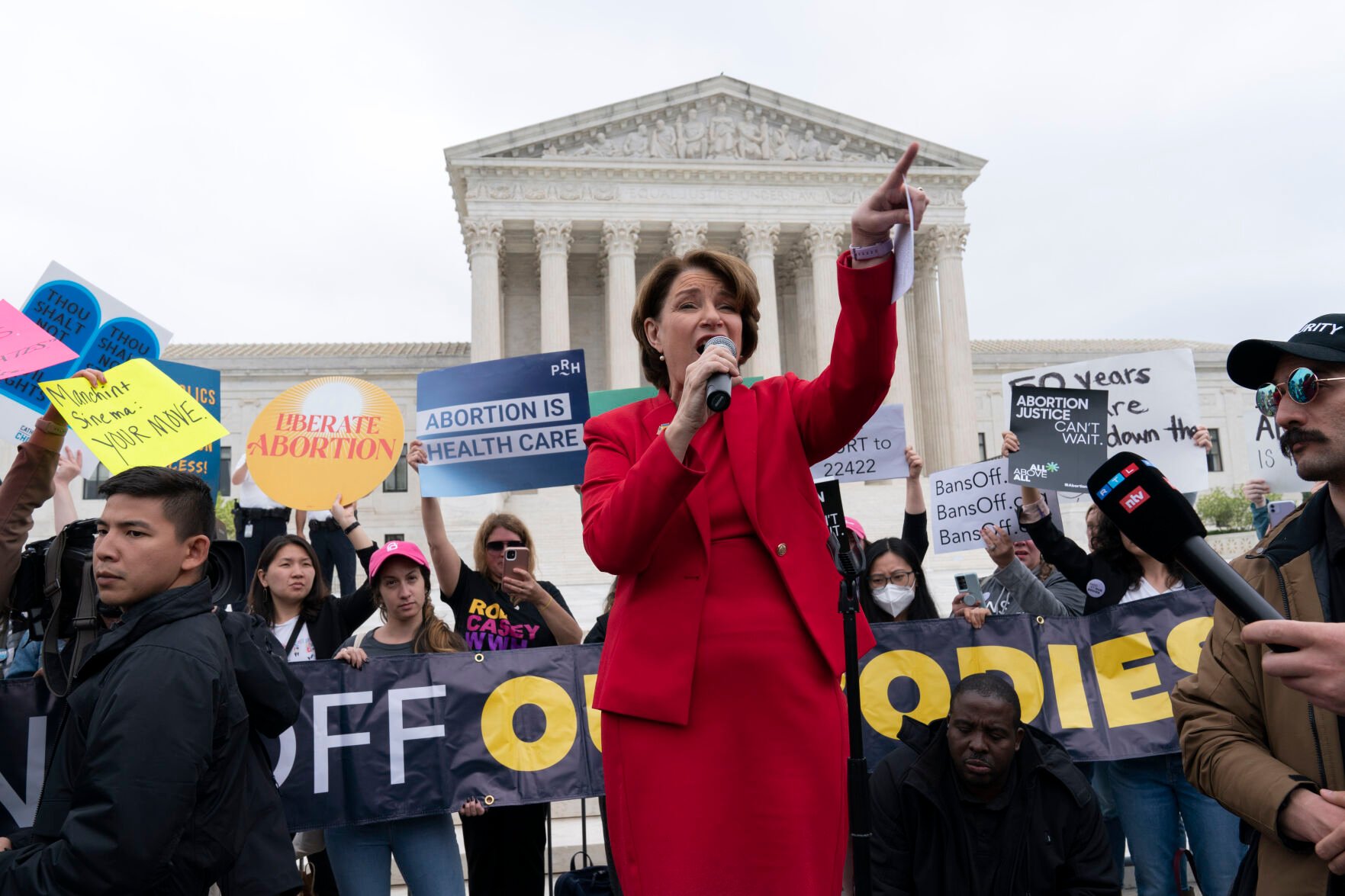 <p>Sen. Amy Klobuchar, D-Minn. speaks outside of the U.S. Supreme Court Tuesday, May 3, 2022 in Washington. </p>