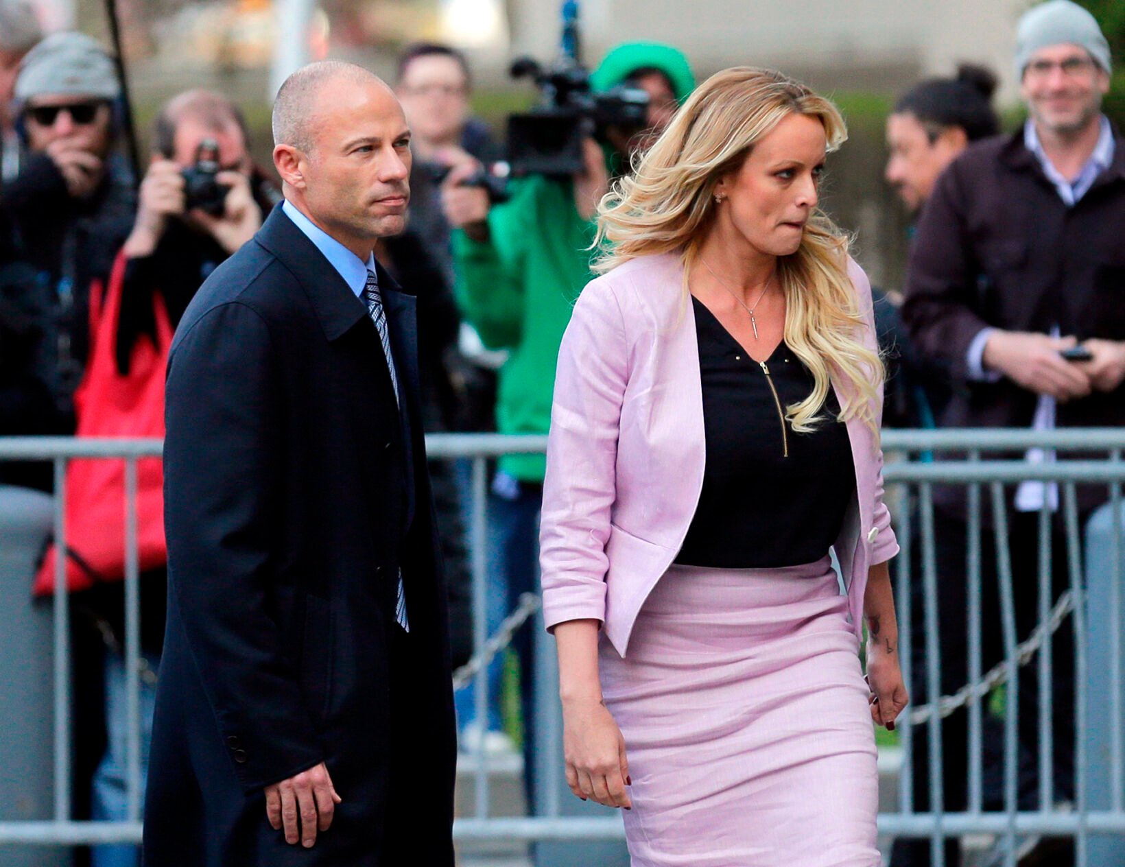 <p>In this April 16, 2018, file photo, Stormy Daniels, right, and her attorney Michael Avenatti turn from the microphones after speaking as they leave federal court in New York.</p>