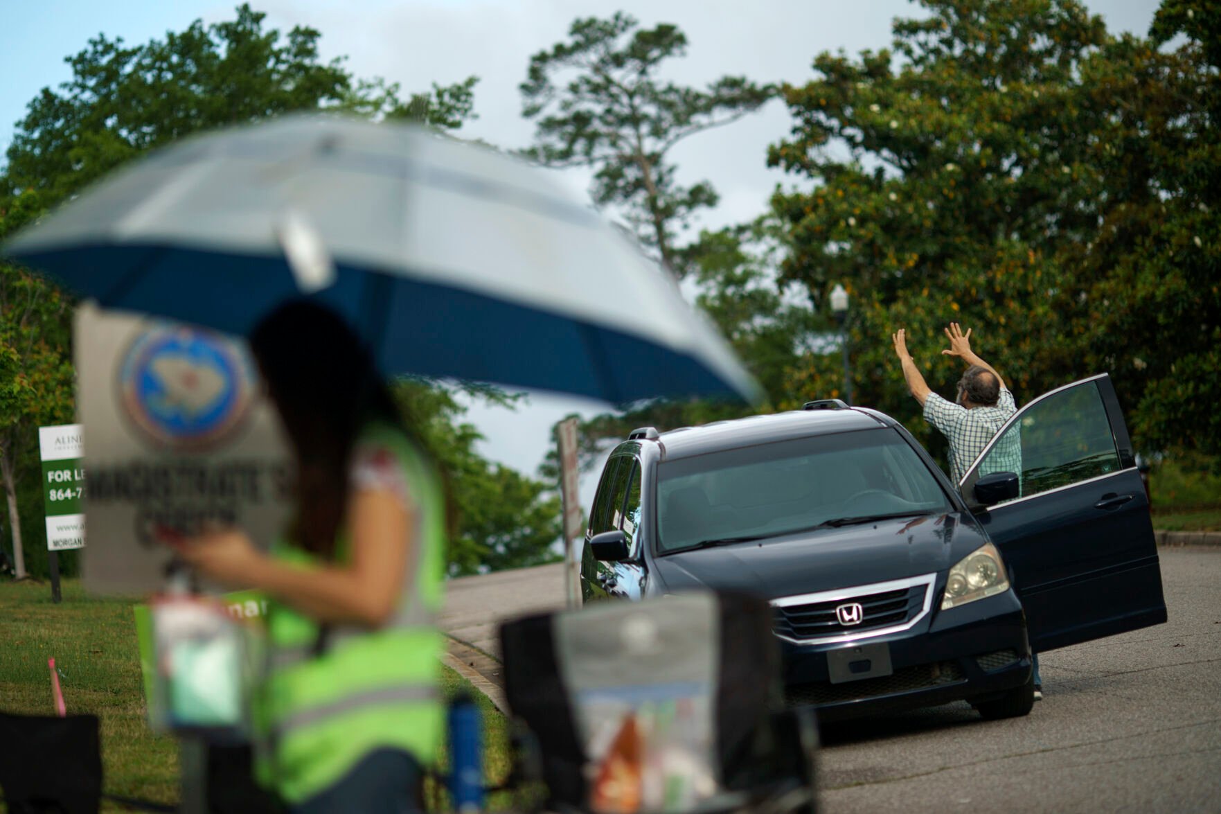 <p>Anti-abortion protester Steven Lefemine, prays as he arrives to set up outside the Planned Parenthood clinic where patients will be arriving for abortion appointments Friday, May 27, 2022, in Columbia, S.C. </p>