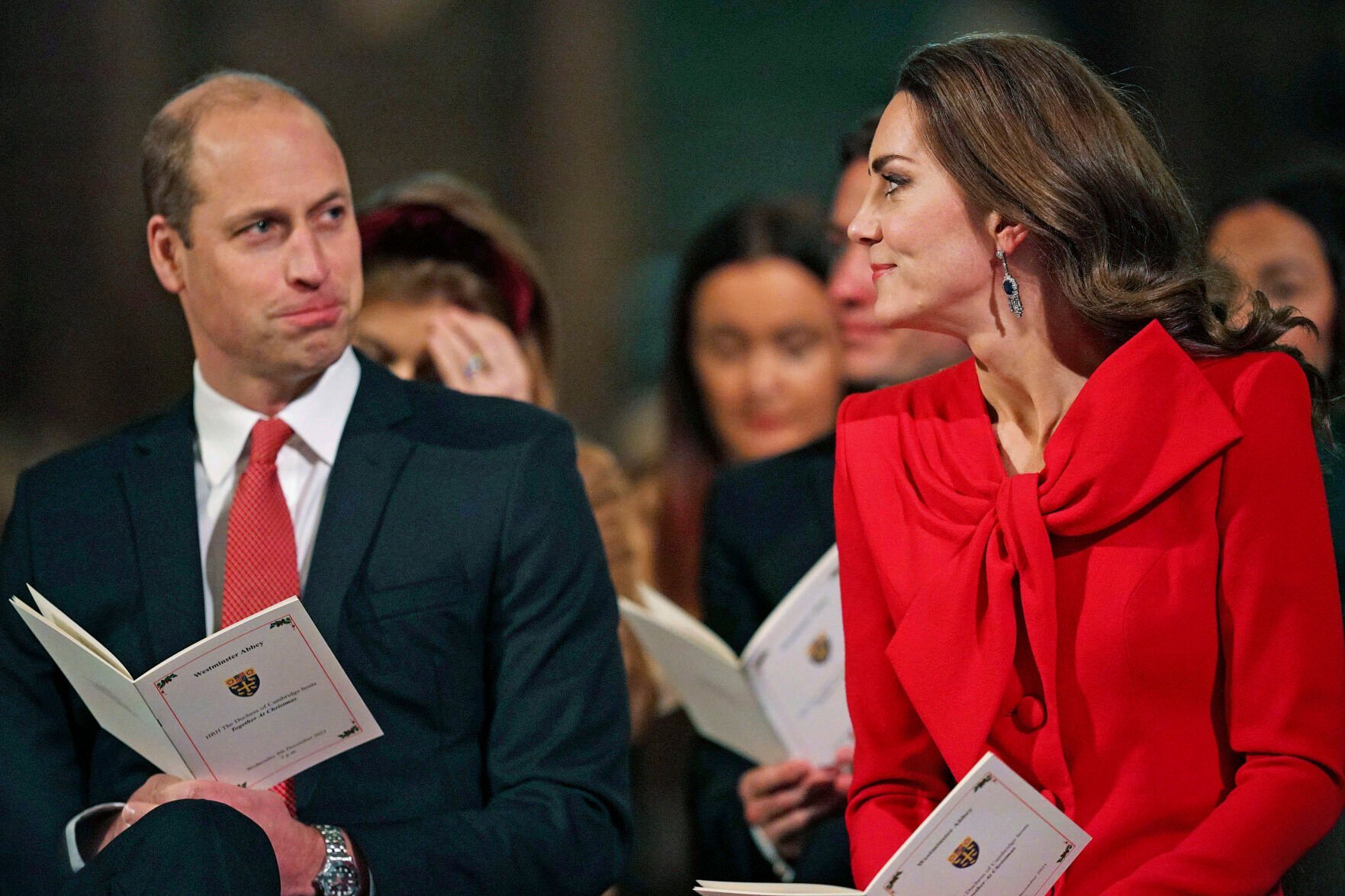 <p>FILE Britain's Prince William, left and Kate, the Duchess of Cambridge attend the 'Royal Carols - Together At Christmas', a Christmas carol concert hosted by the duchess at Westminster Abbey in London, Wednesday Dec. 8, 2021. </p>