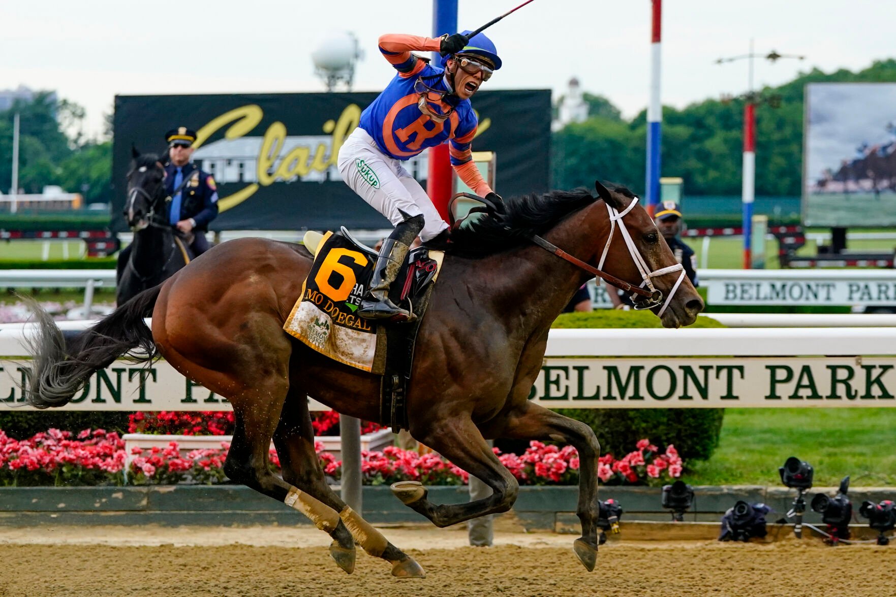 <p>Mo Donegal, with jockey Irad Ortiz Jr. up, crosses the finish line to win the 154th running of the Belmont Stakes horse race, Saturday at Belmont Park in Elmont, N.Y.</p>