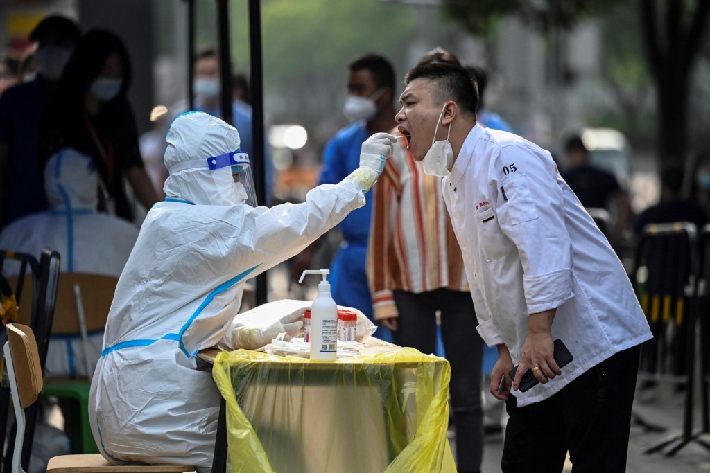 China Cuts Travel Quarantine But Retains Zero Covid Approach