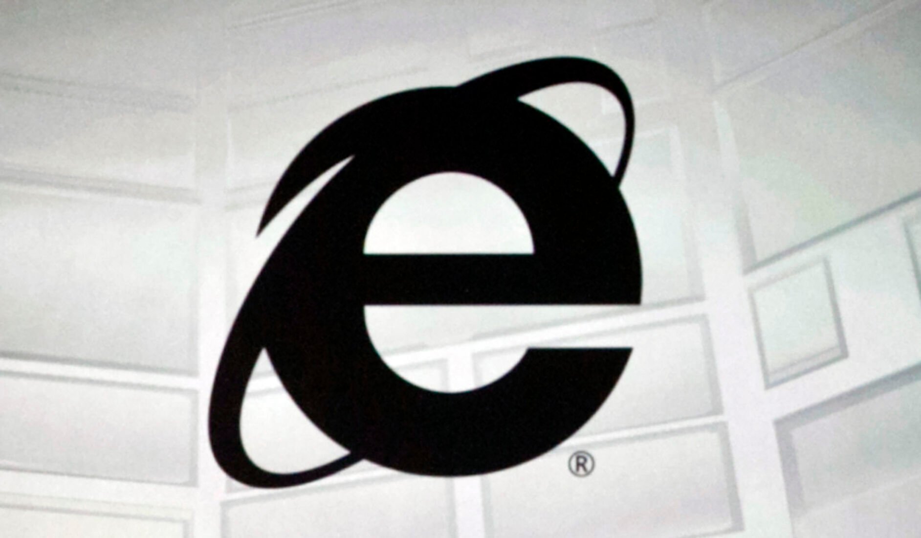 <p>FILE - The Microsoft Internet Explorer logo is projected on a screen during a Microsoft Xbox E3 media briefing in Los Angeles, June 4, 2012. As of Wednesday, June 15, 2022, Microsoft will no longer support the once-dominant browser that legions of web surfers loved to hate and a few still claim to adore. </p>