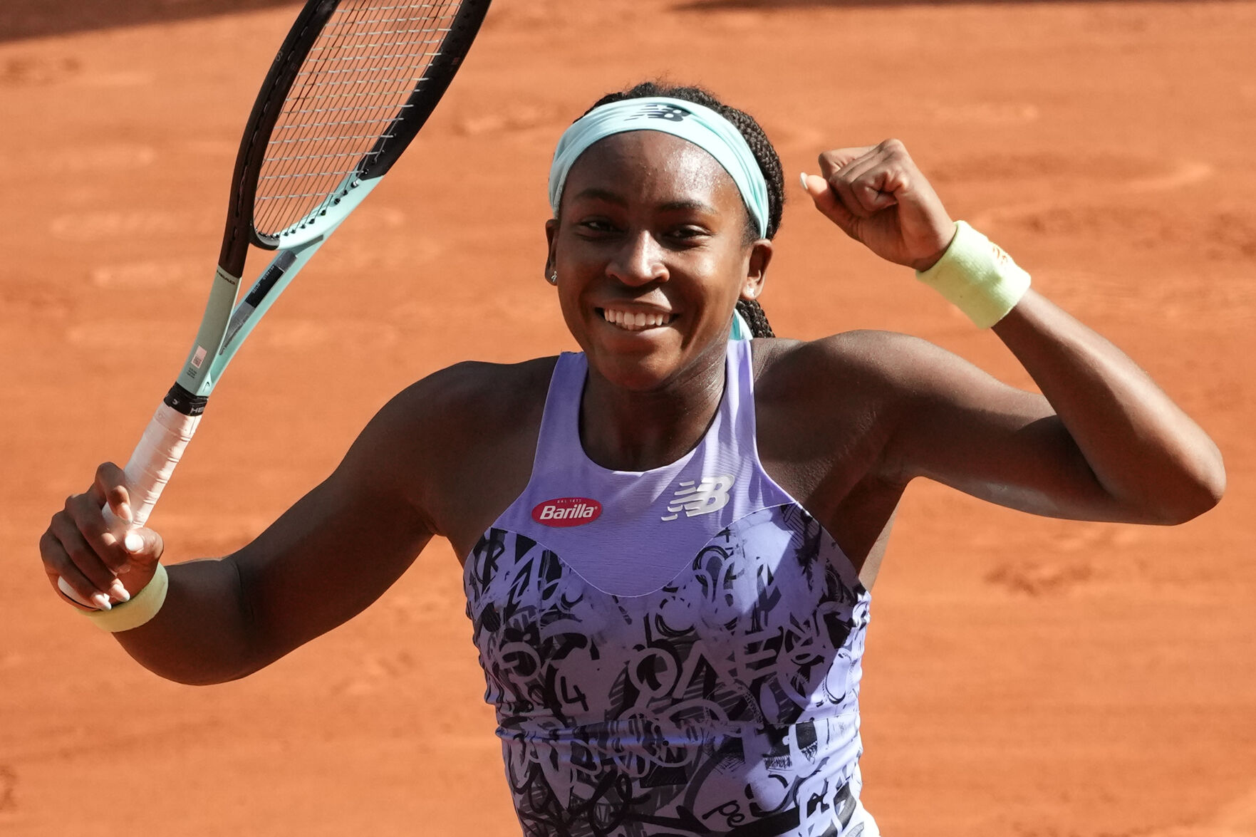 <p>Coco Gauff of the U.S. reacts as she defeats Italy's Martina Trevisan during their semifinal match of the French Open tennis tournament at the Roland Garros stadium Thursday, June 2, 2022 in Paris. Gauff won 6-3, 6-1.</p>
