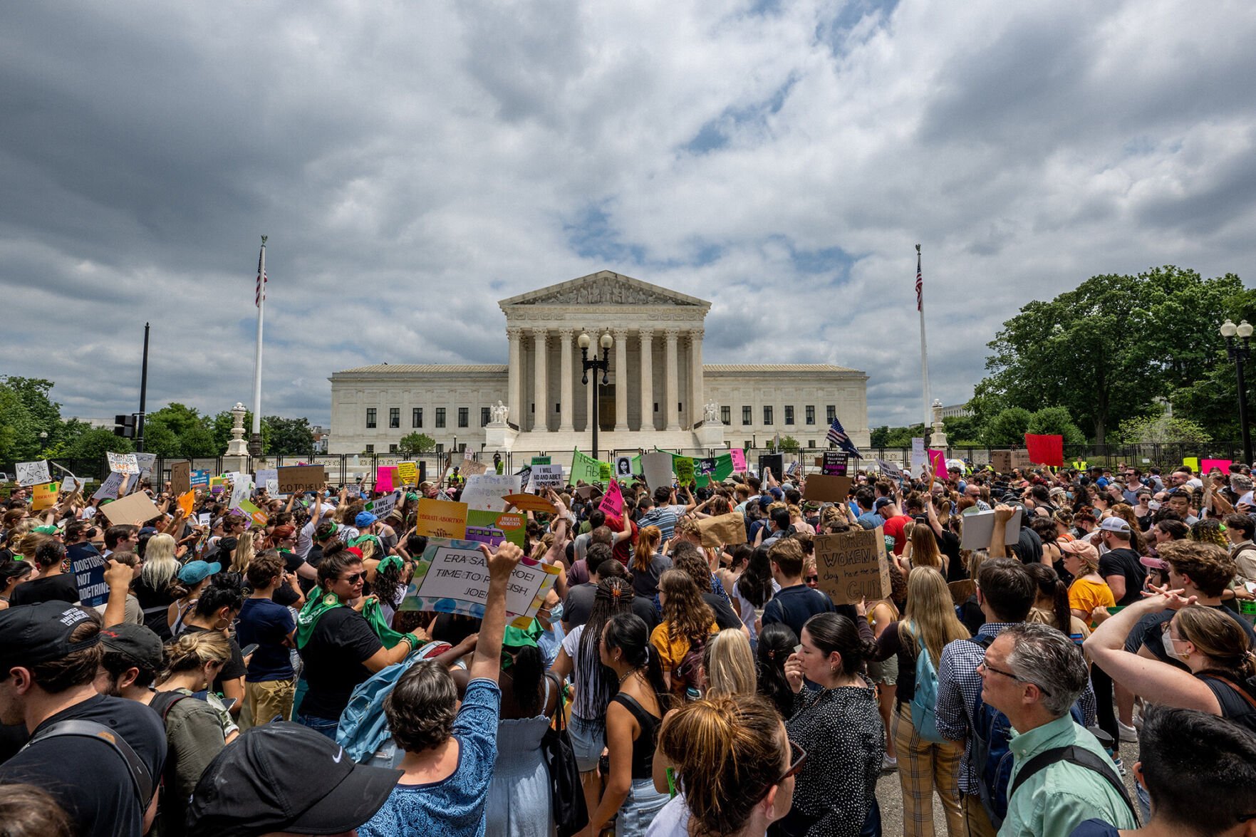 <p>People protest in response to the Dobbs v Jackson Women's Health Organization ruling in front of the U.S. Supreme Court on June 24.</p>