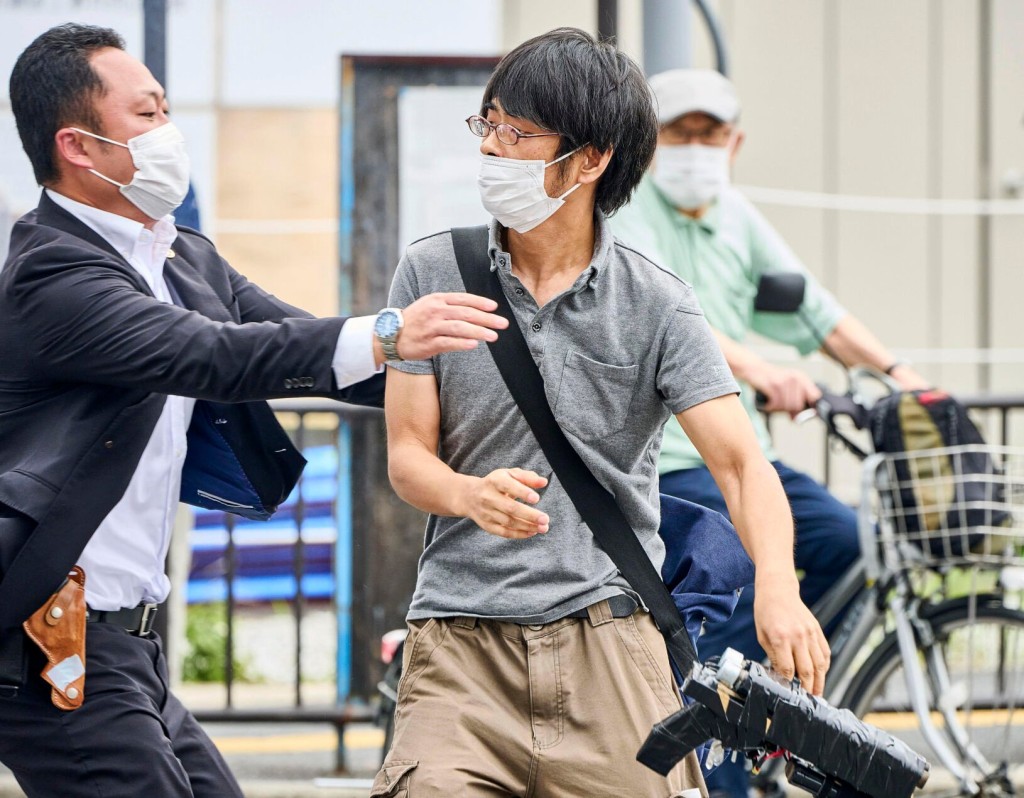 Assassination Stuns World That Associates Japan With Gun Control