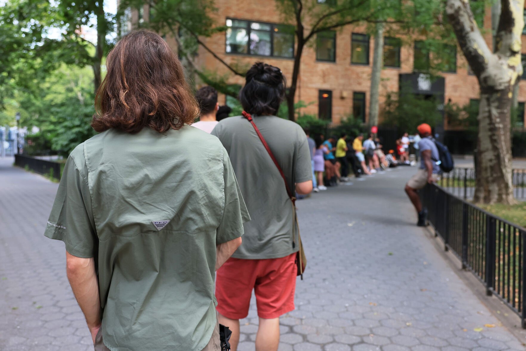 <p>People wait in line to enter the Chelsea Sexual Health Clinic on July 8, 2022, in New York City. The Chelsea clinic was one of two locations administering a vaccine for monkeypox in New York City.</p>