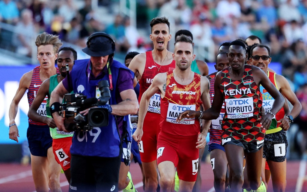 Cameraman Accidentally Becomes Obstacle In World Athletics Championship Race
